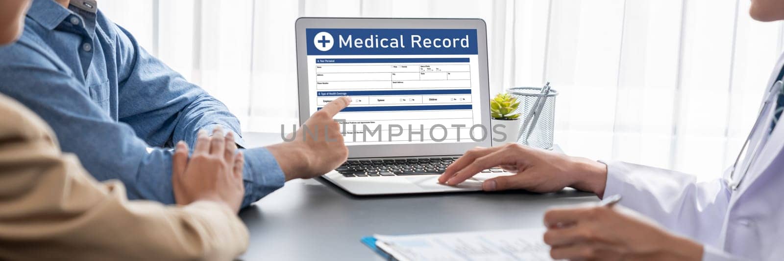 Doctor show medical diagnosis report on laptop to young couple. Neoteric by biancoblue