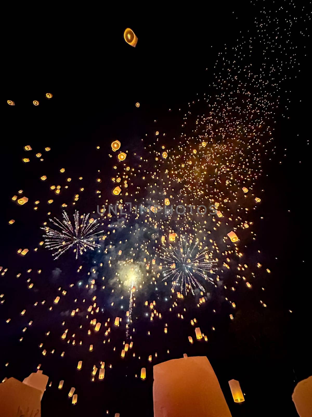 Sky lantern mass release event for Yee Peng and Loy Krathong festival in Chiang Mai, Thailand, south east asia