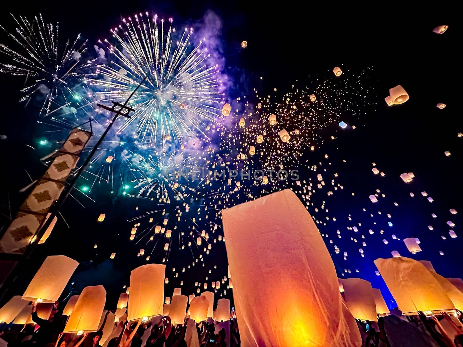 Sky lantern mass release event for Yee Peng and Loy Krathong festival in Chiang Mai, Thailand, south east asia