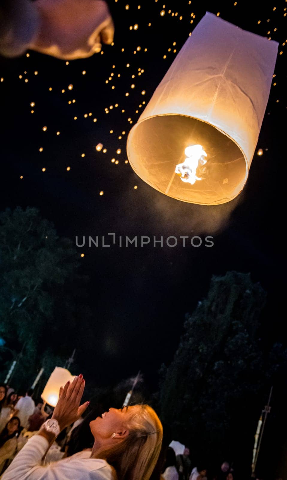 Sky lantern mass release event for Yee Peng and Loy Krathong festival in Chiang Mai, Thailand, south east asia