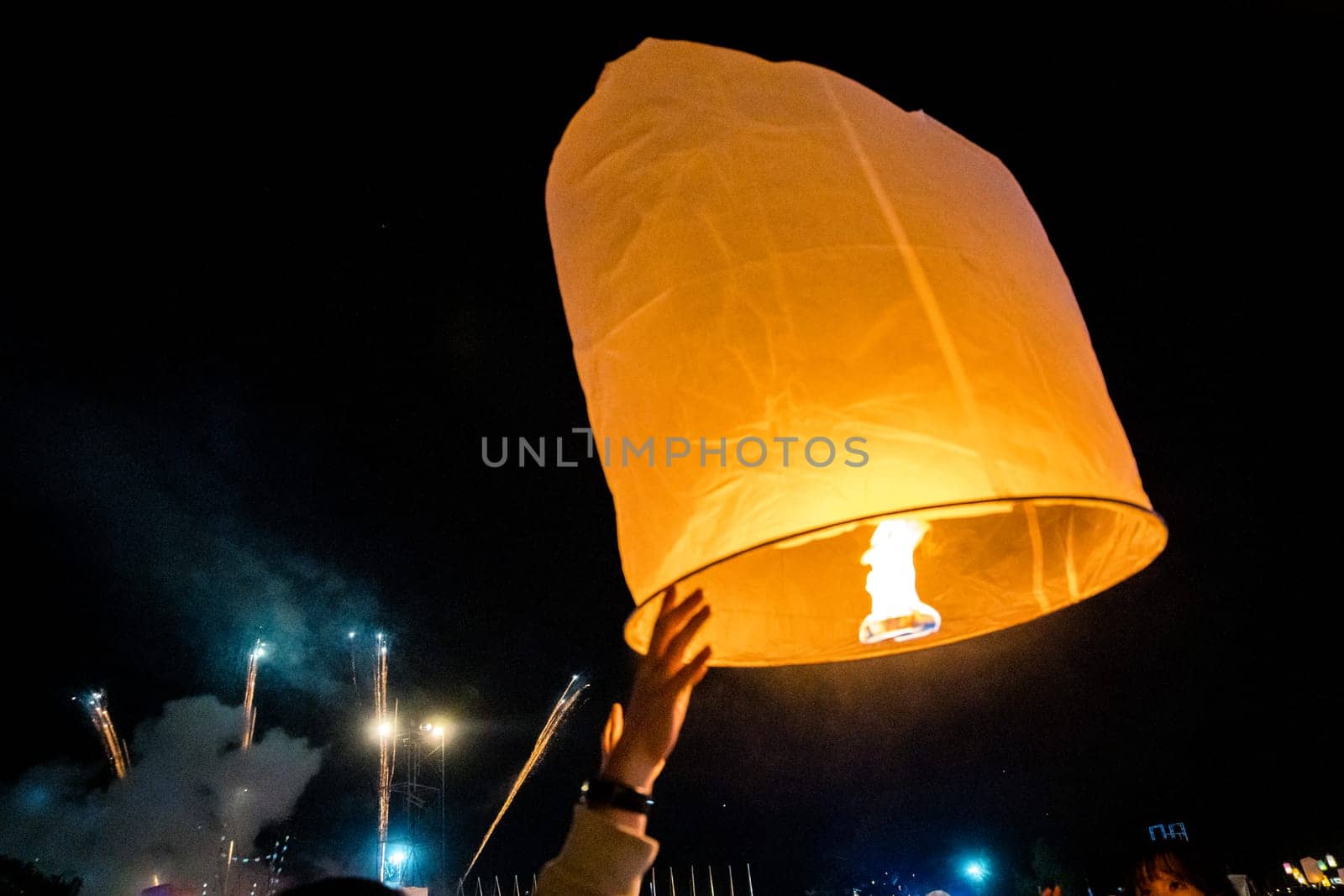 Sky lantern mass release event for Yee Peng and Loy Krathong traditional festival in Chiang Mai, Thailand by worldpitou
