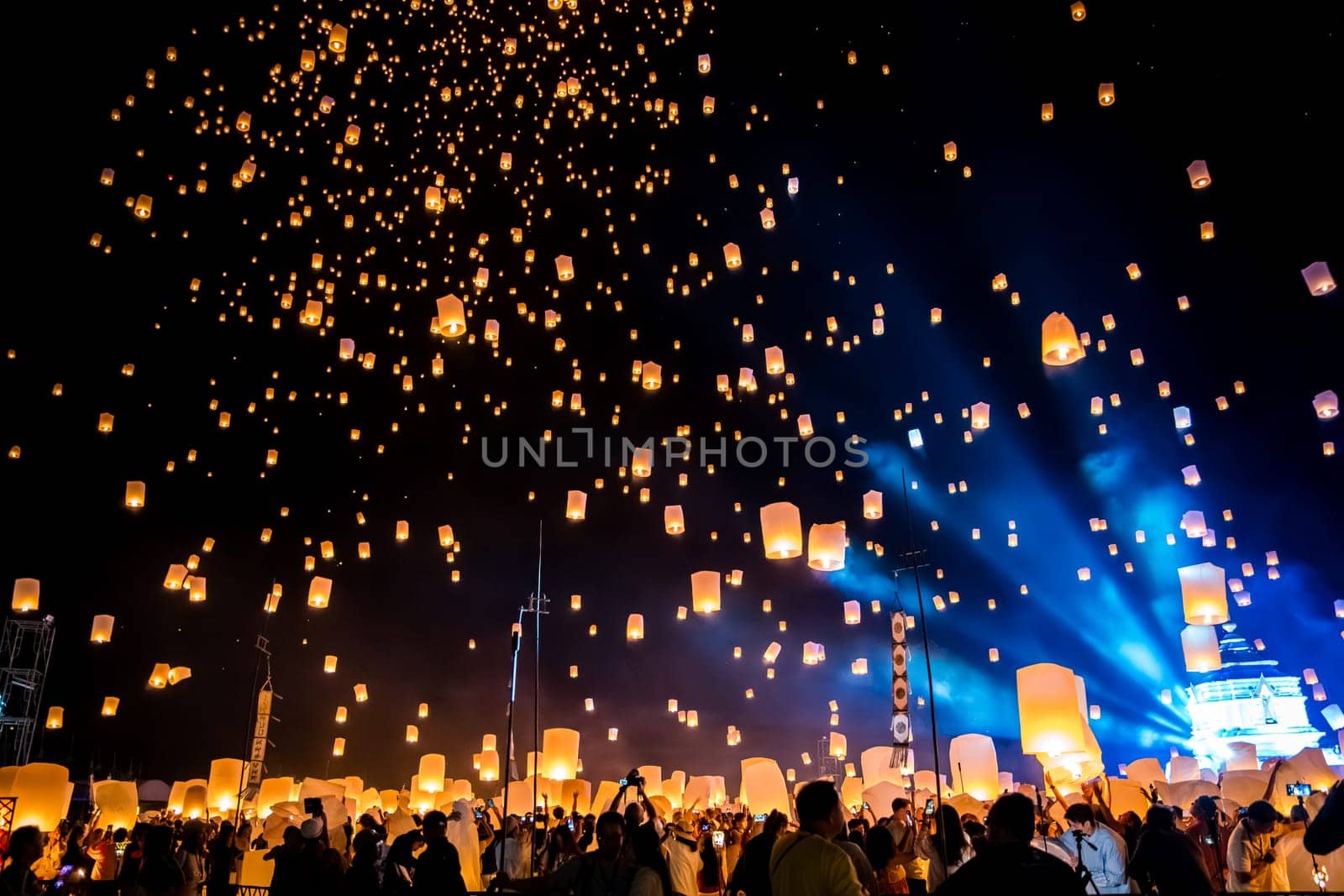 Sky lantern mass release event for Yee Peng and Loy Krathong traditional festival in Chiang Mai, Thailand by worldpitou