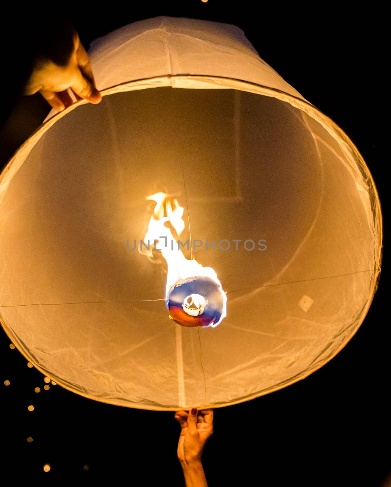 Sky lantern mass release event for Yee Peng and Loy Krathong festival in Chiang Mai, Thailand, south east asia