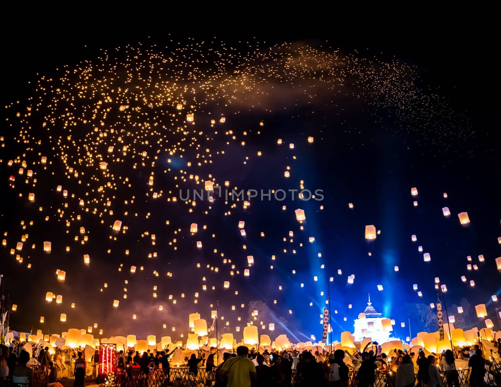 Sky lantern mass release event for Yee Peng and Loy Krathong festival in Chiang Mai, Thailand, south east asia