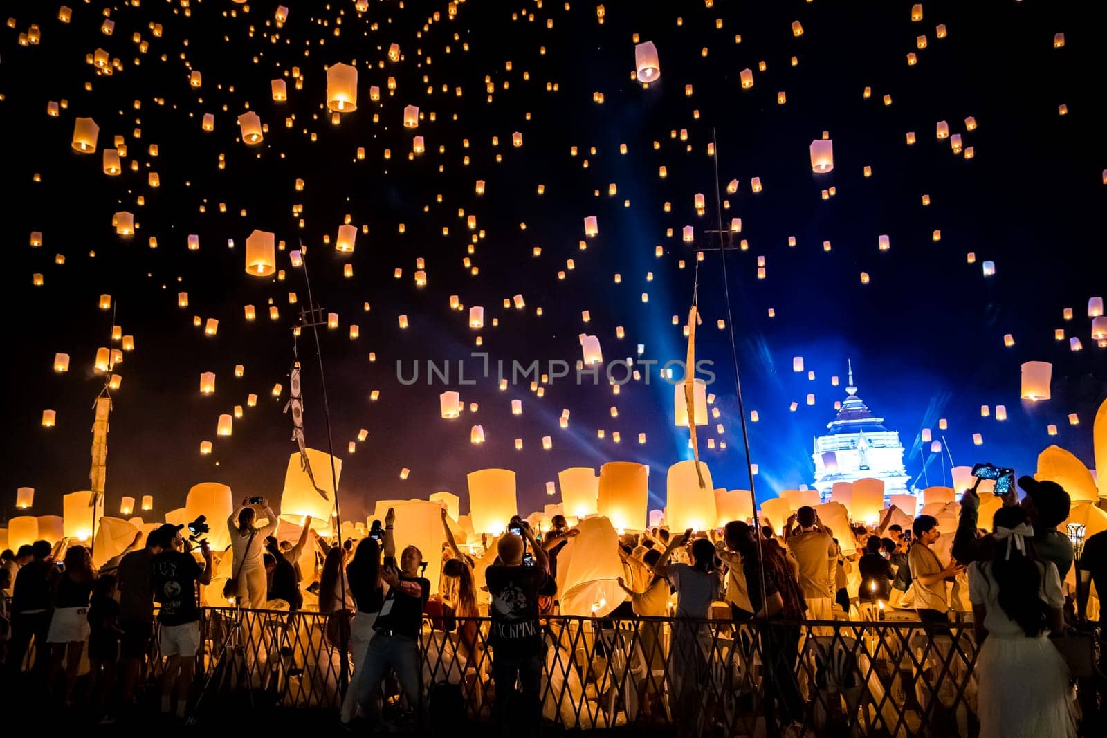 Sky lantern mass release event for Yee Peng and Loy Krathong festival in Chiang Mai, Thailand, south east asia