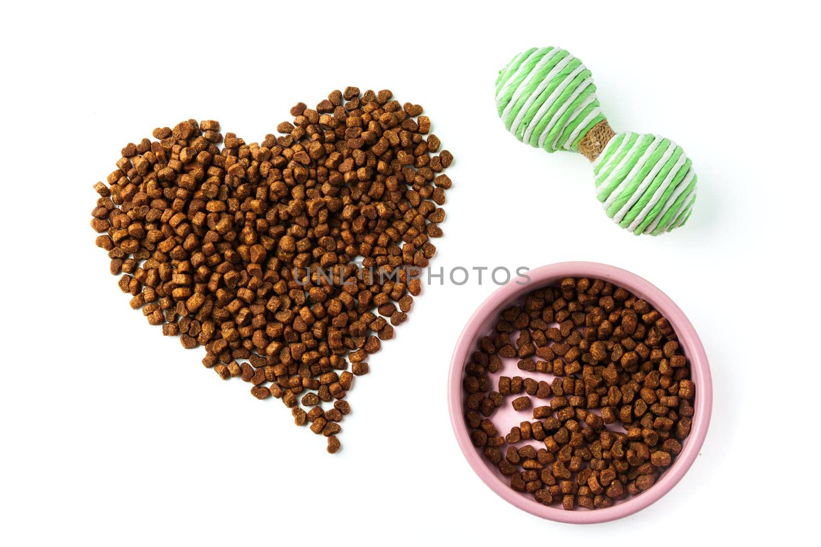 Bowl with dry pet food isolated on white background close up