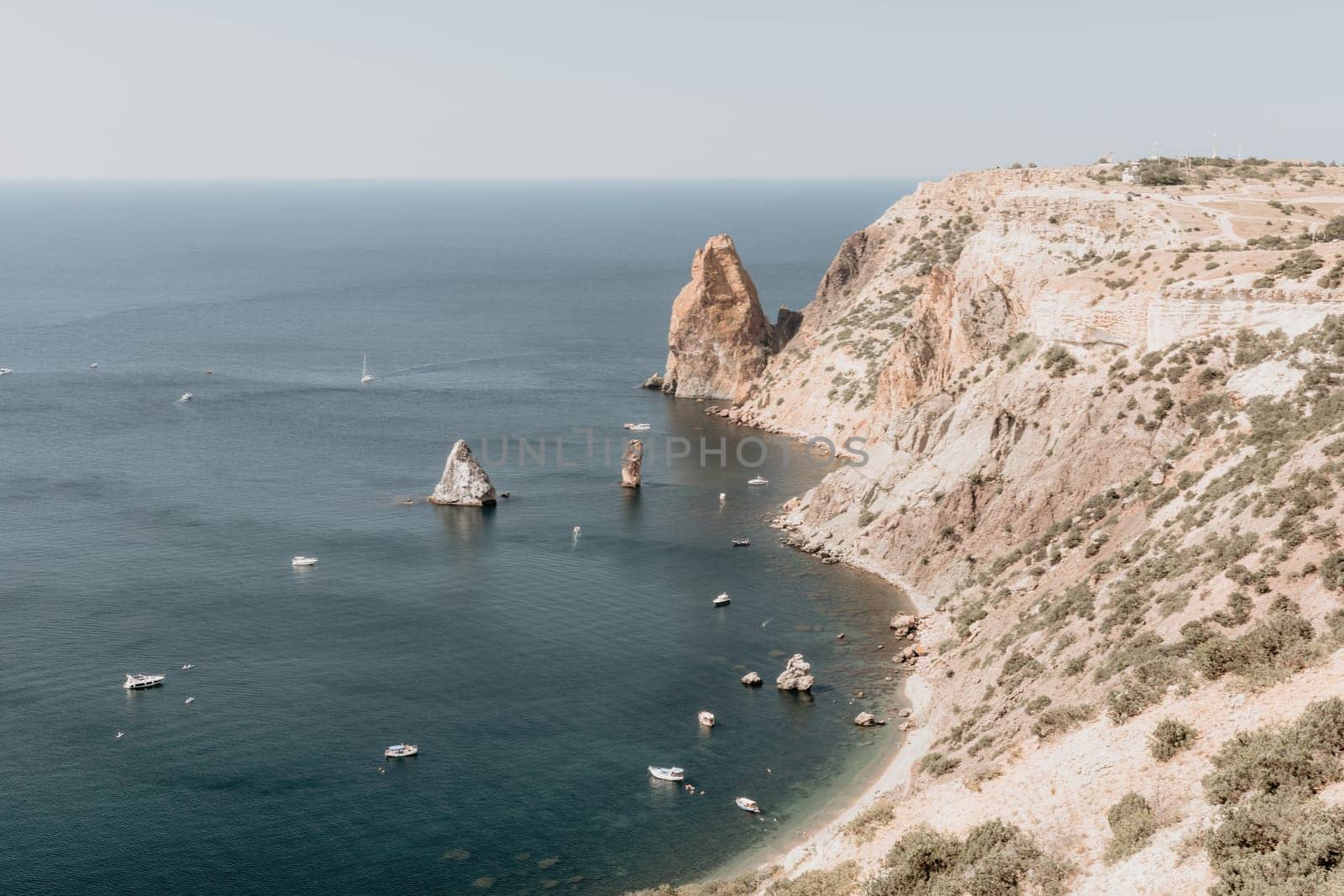 Aerial panoramic view of beautiful sunset above sea. Beautiful seascape. Sun glare, small waves on the water surface. Evening. Horizon. Nobody. No people. Copy space. Never-ending beauty of nature