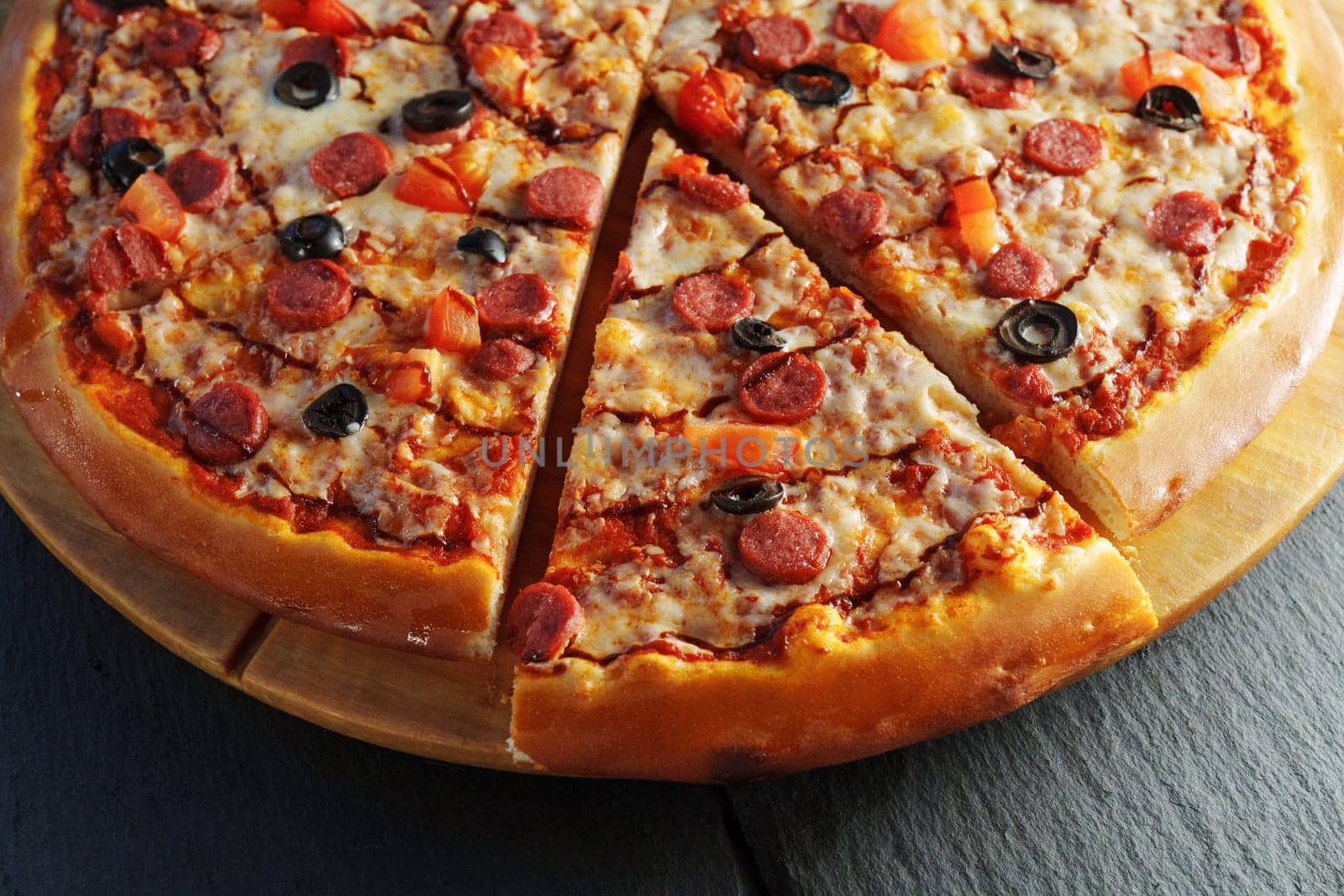 Pepperoni Pizza Perfection on Wooden Platter, close up by darksoul72