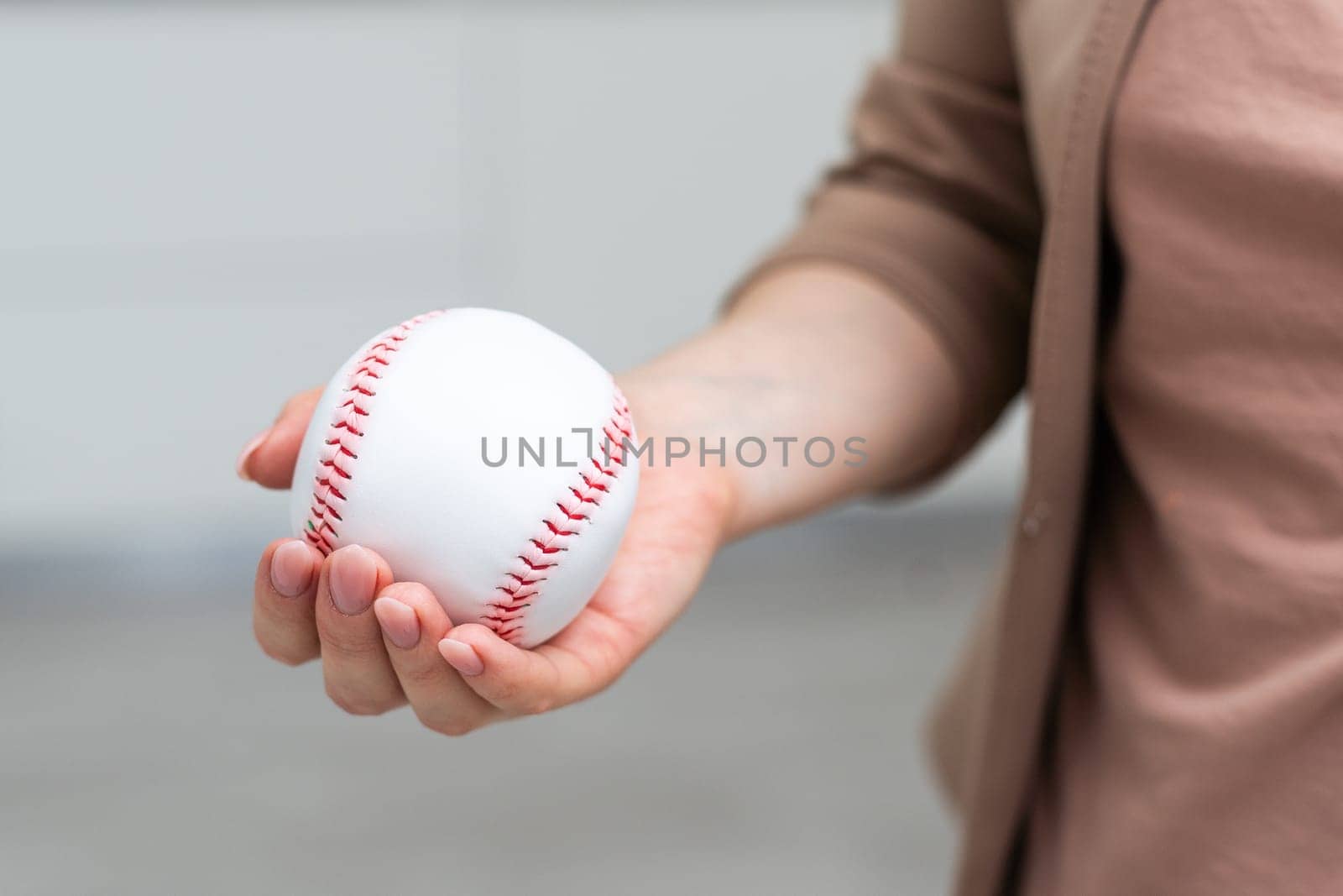 Small toy baseball isolated on white background. High quality photo