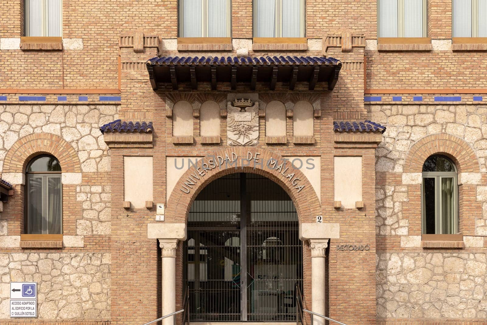 Malaga, Spain- 26-01-2024: Entrance of Universidad de Malaga with traditional brickwork, perfect for educational themes or Spanish architecture. The University of Malaga