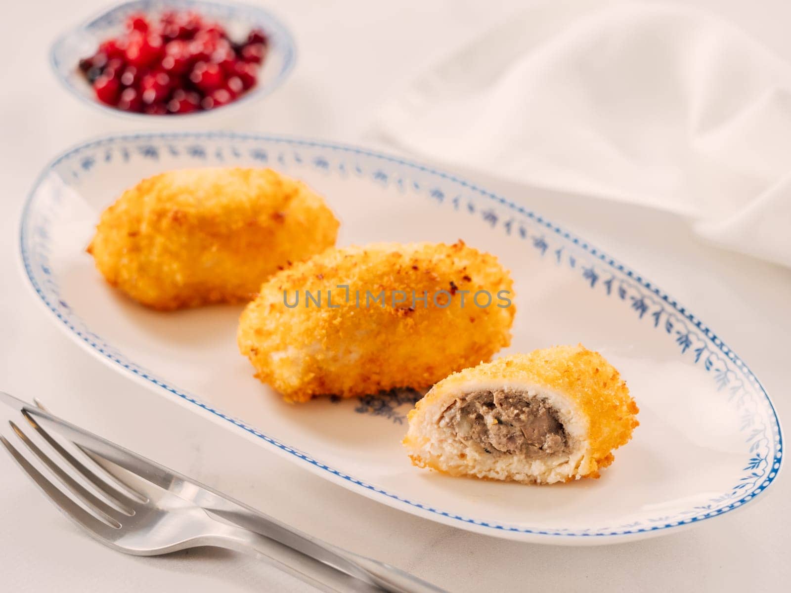 Crispy breaded cutlet. Three perfect crunchy cutlet on plate. Delicious fried cutlets in bread crumbs made from beef, pork, chicken meat or fish