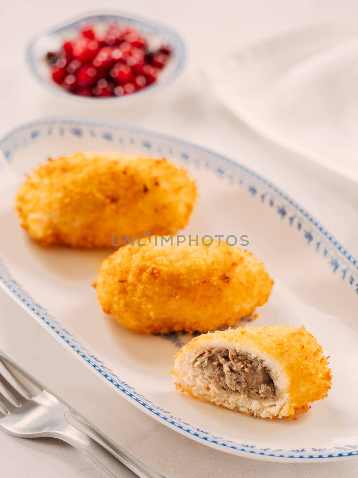 Crispy breaded cutlet. Three perfect crunchy cutlet on plate. Delicious fried cutlets in bread crumbs made from beef, pork, chicken meat or fish