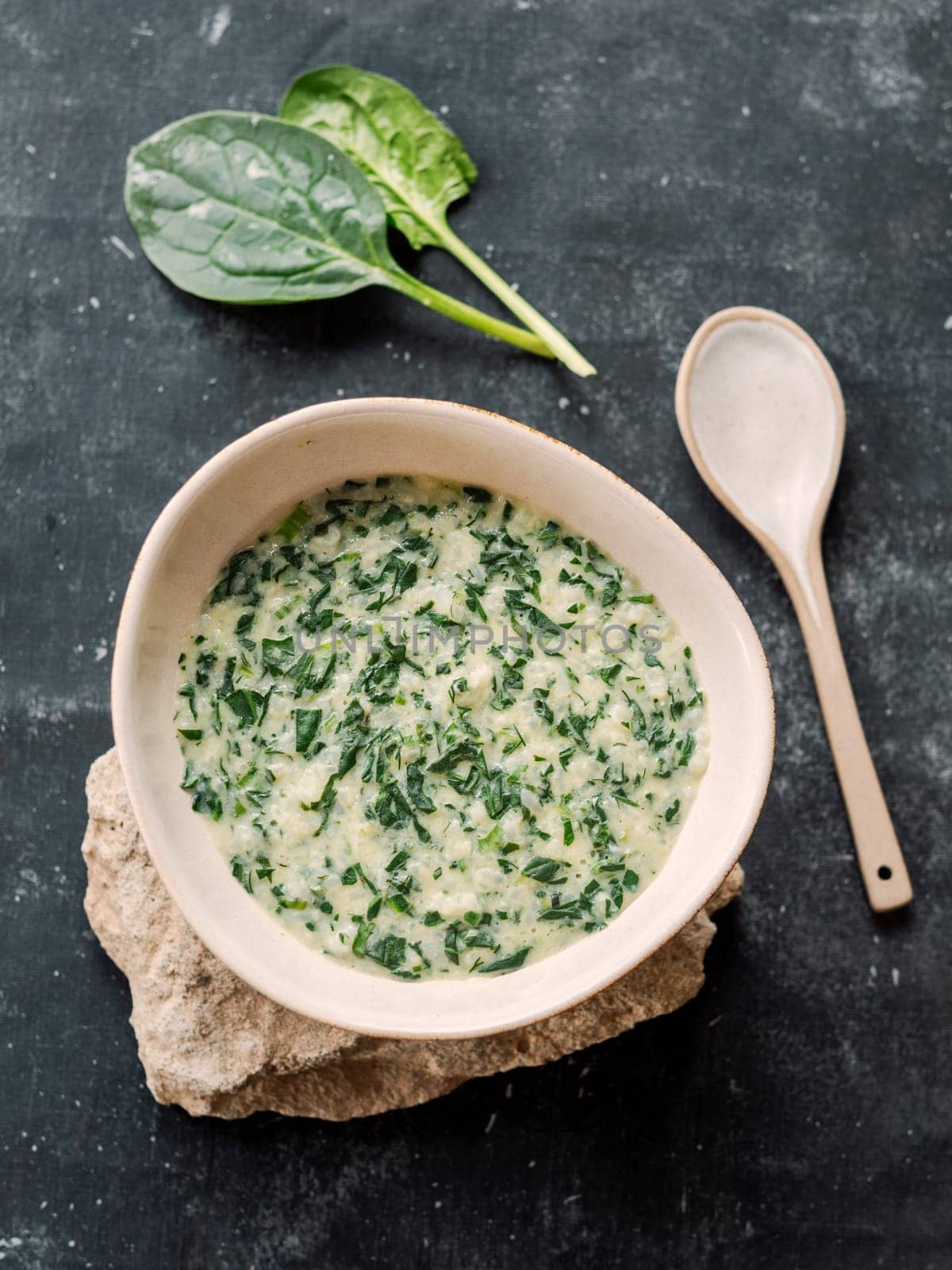 Greeny rice porridge Dzhirkhyn - Ossetian, Caucasian and Jewish cuisine. Rice porridge with eggs, sour cream and fresh green as spinach and thyme