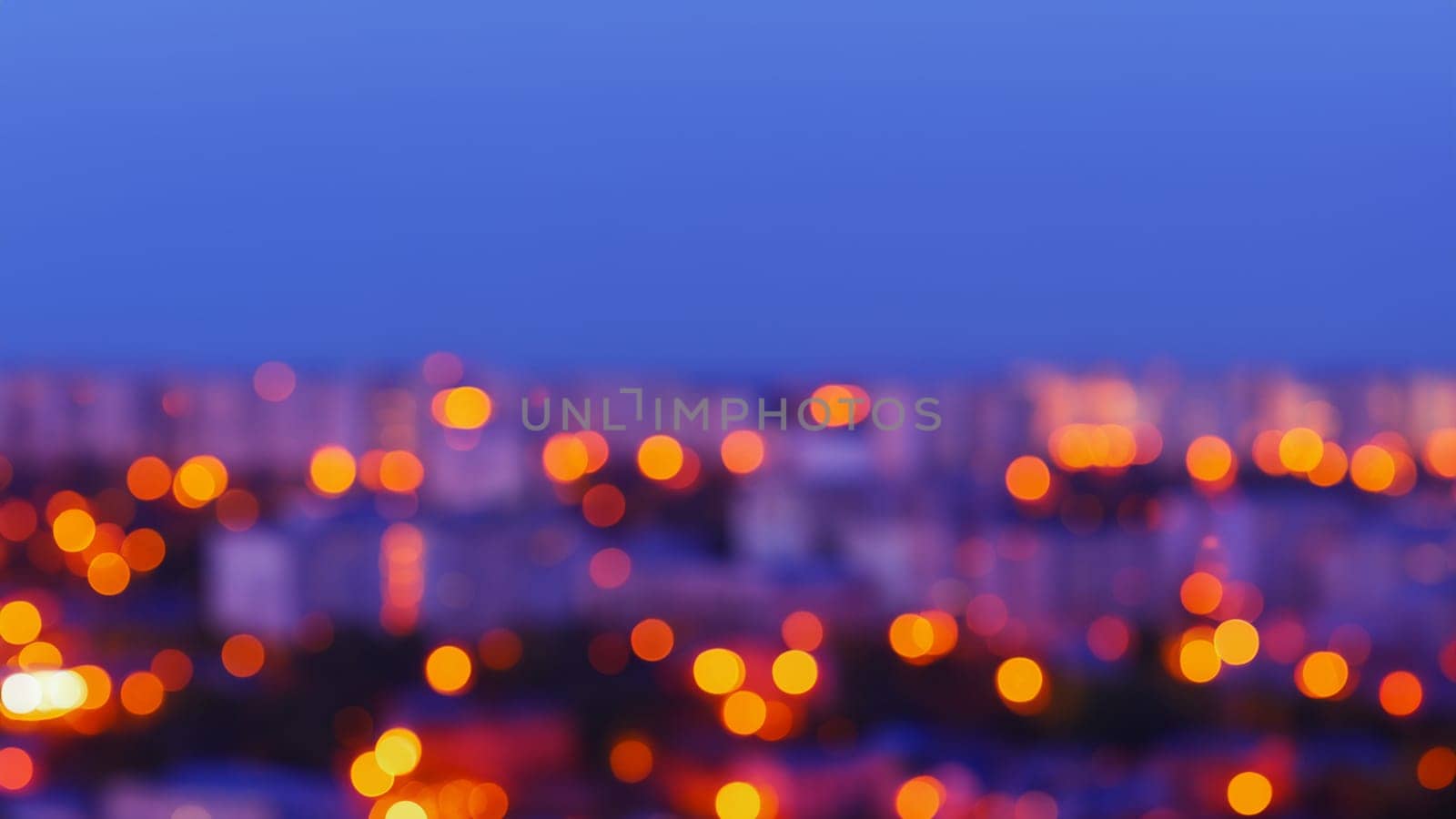 City night lights bokeh defocused background, abstract urban landscape