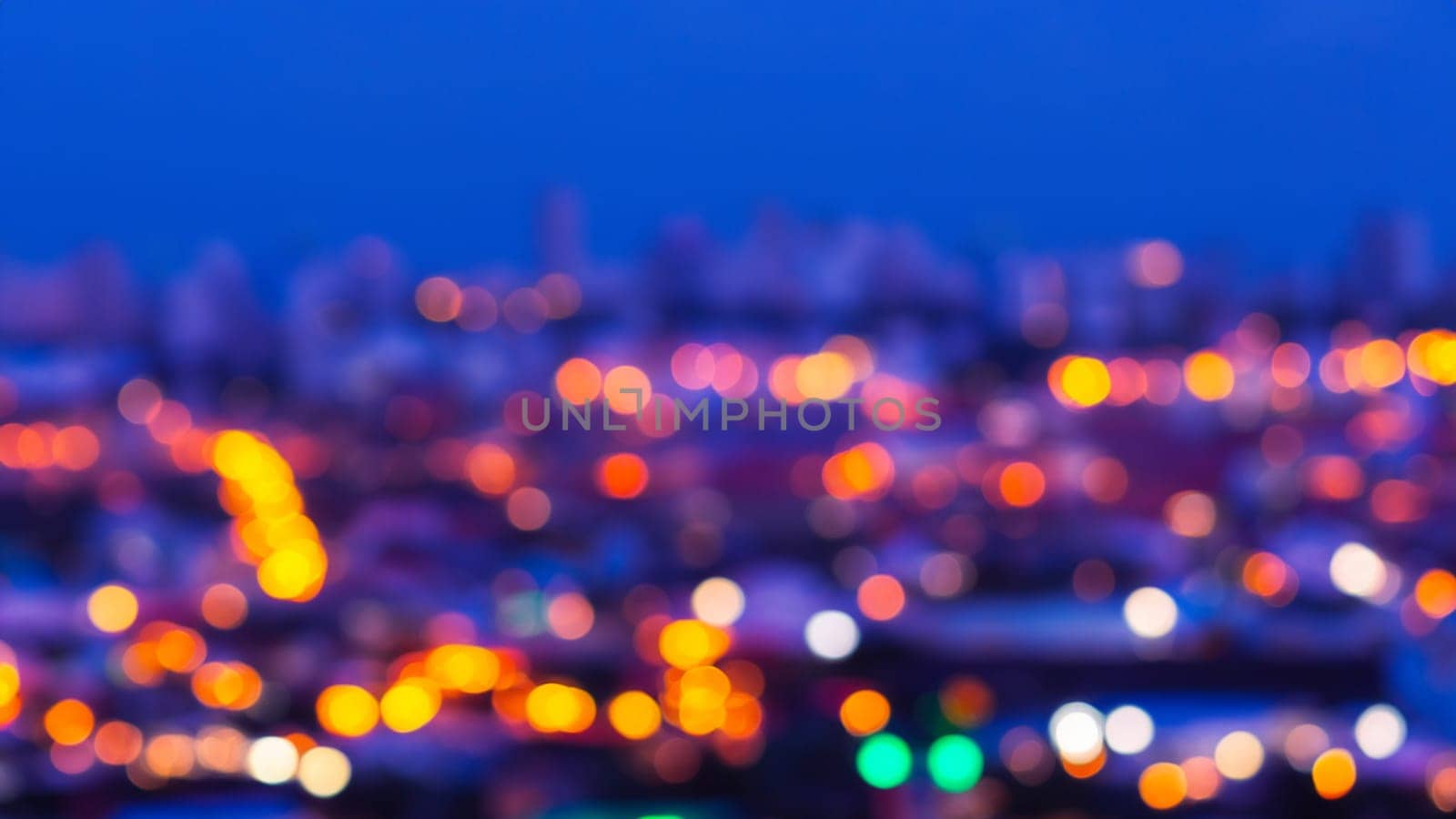 Abstract Bokeh of city at twilight time, purple and blue