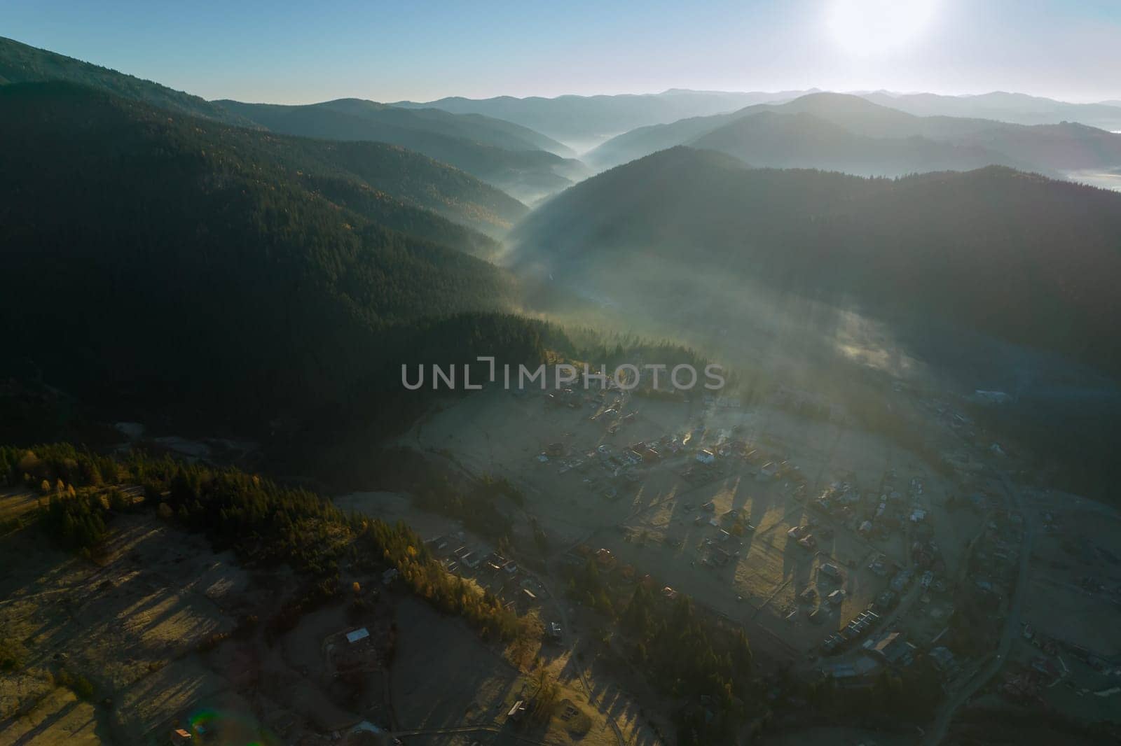 Juxtaposition of mist and mountains transformed ordinary forest into scene of extraordinary beauty. by Yaroslav