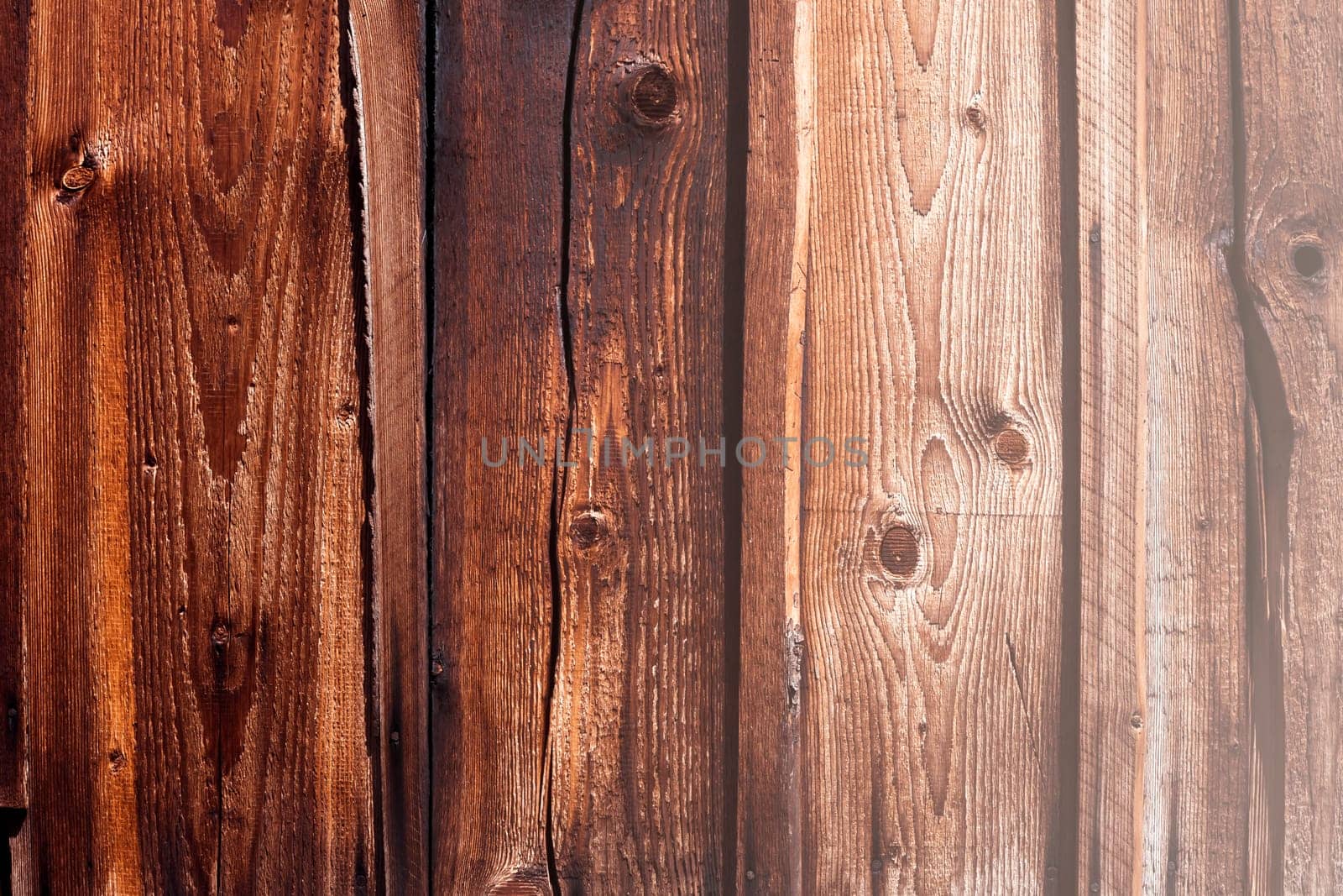 Background with old wooden boards, vintage dark shade, textured and scratched, woody house wall or floor.