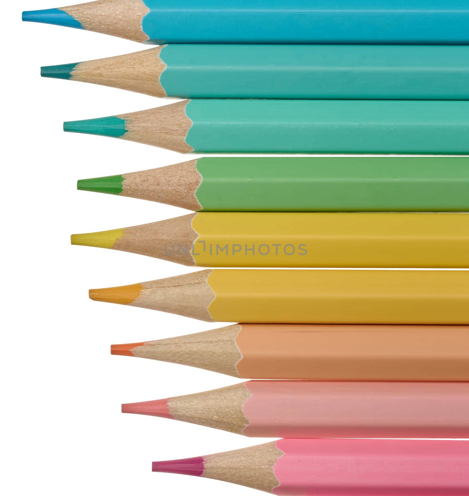 Multi-colored wooden pencils on a white background by ndanko
