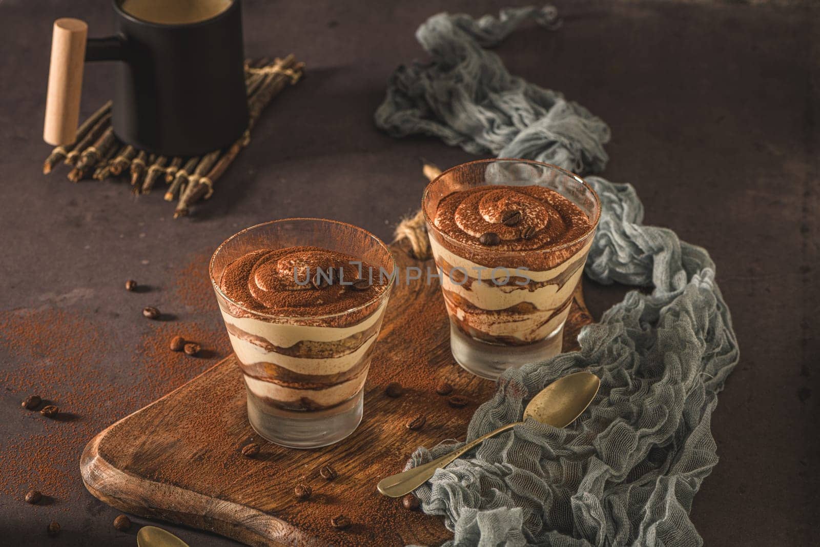 Tiramisu dessert in glasses by homydesign