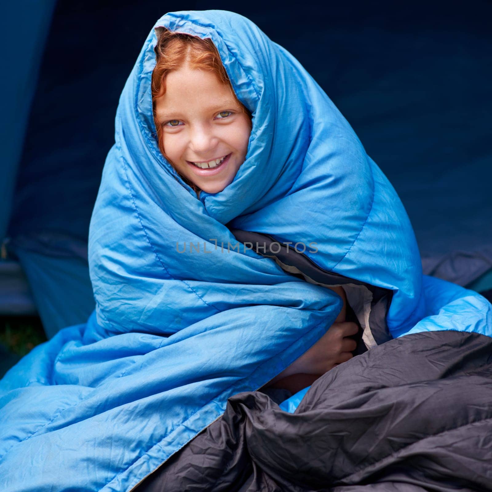Happy, camping and portrait of child in sleeping bag for resting, relax and comfortable in tent. Travel gear, youth and girl in sleep sack for adventure on holiday, vacation and weekend outdoors.
