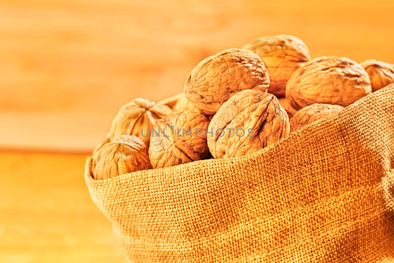 Fruit of walnuts in brown bag, healthy eating ,nutritional supplement