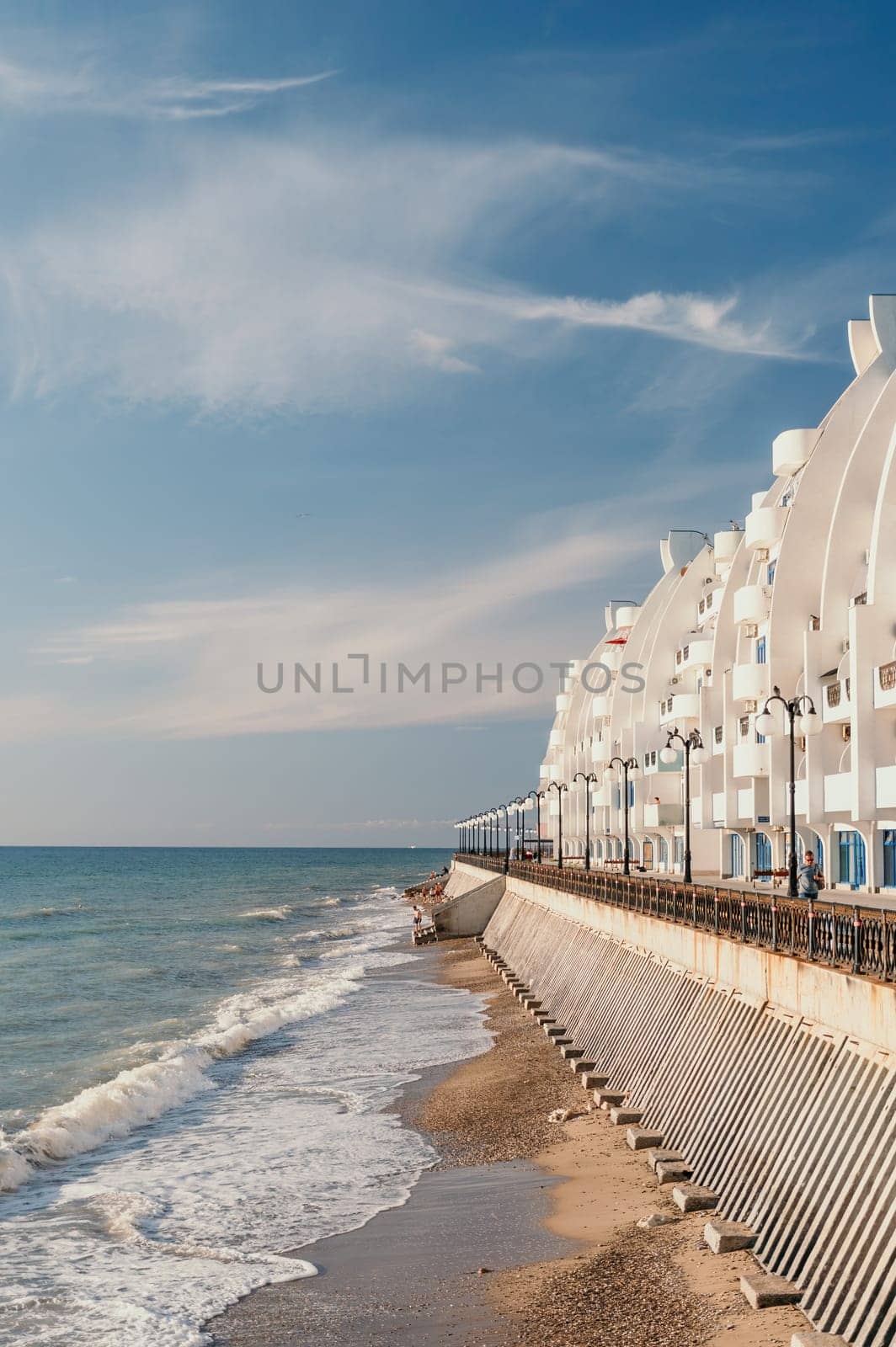 coastal area with apartment buildings of residential areas, modern hotel and restaurant complex on water and sandy beaches