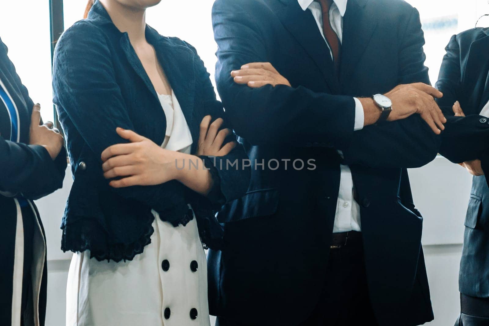 Many business people meeting stand in row with arms crossed and confident. Company organization employee unity and support. Concept of corporate partnership and human resources growth management. uds