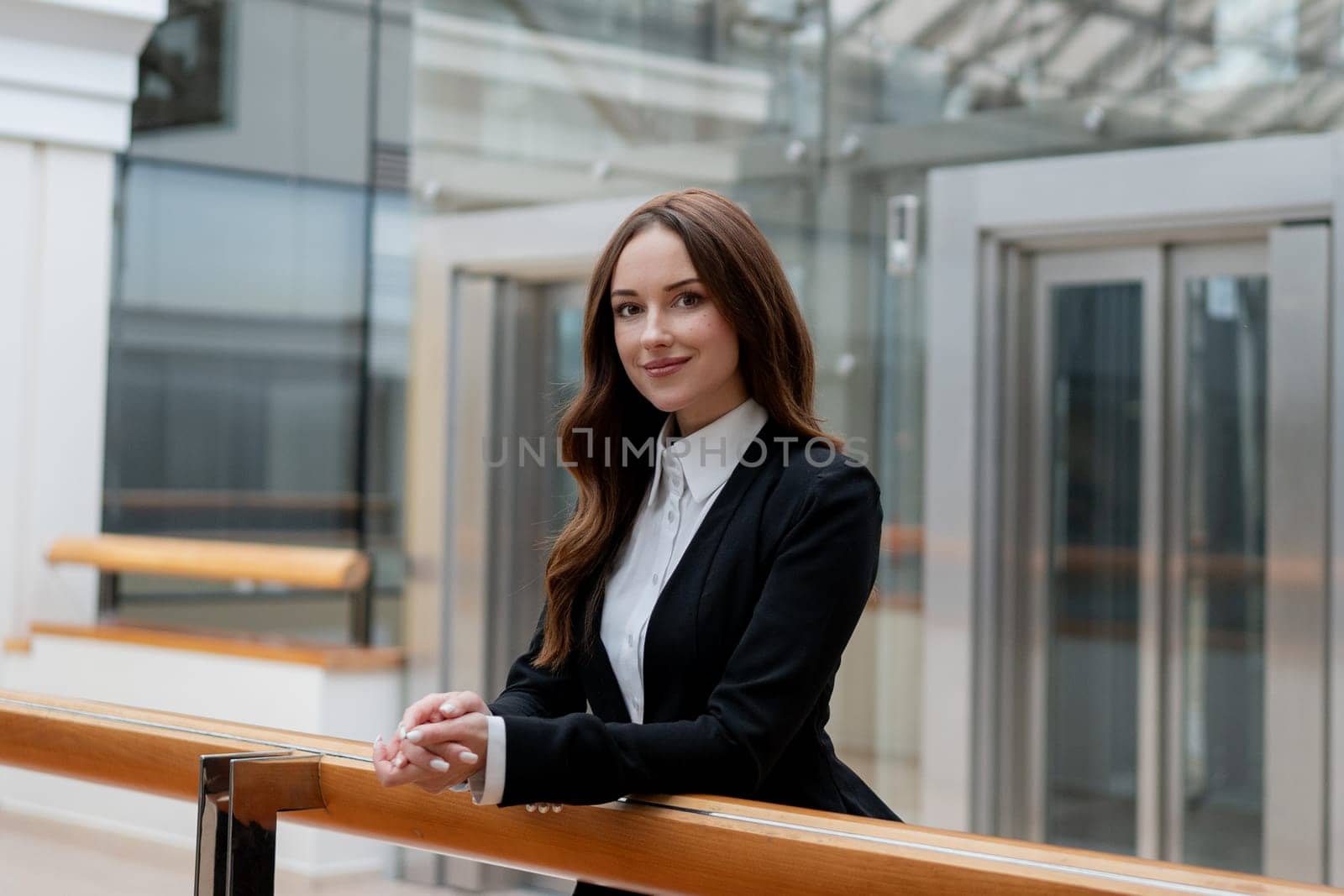 Smiling businesswoman in the office. High quality photo