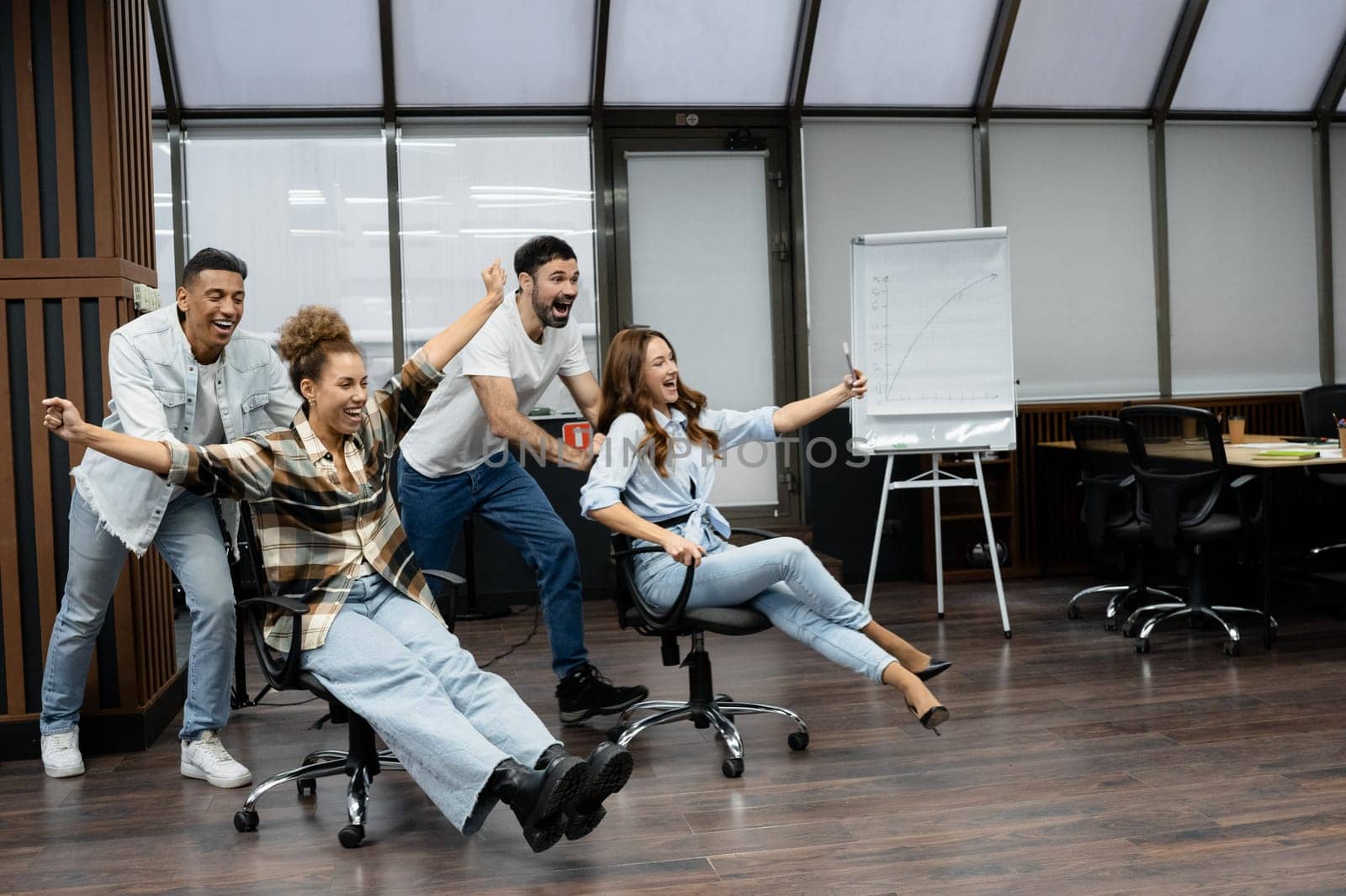 Group of diverse businesspeople working together in a modern workspace.