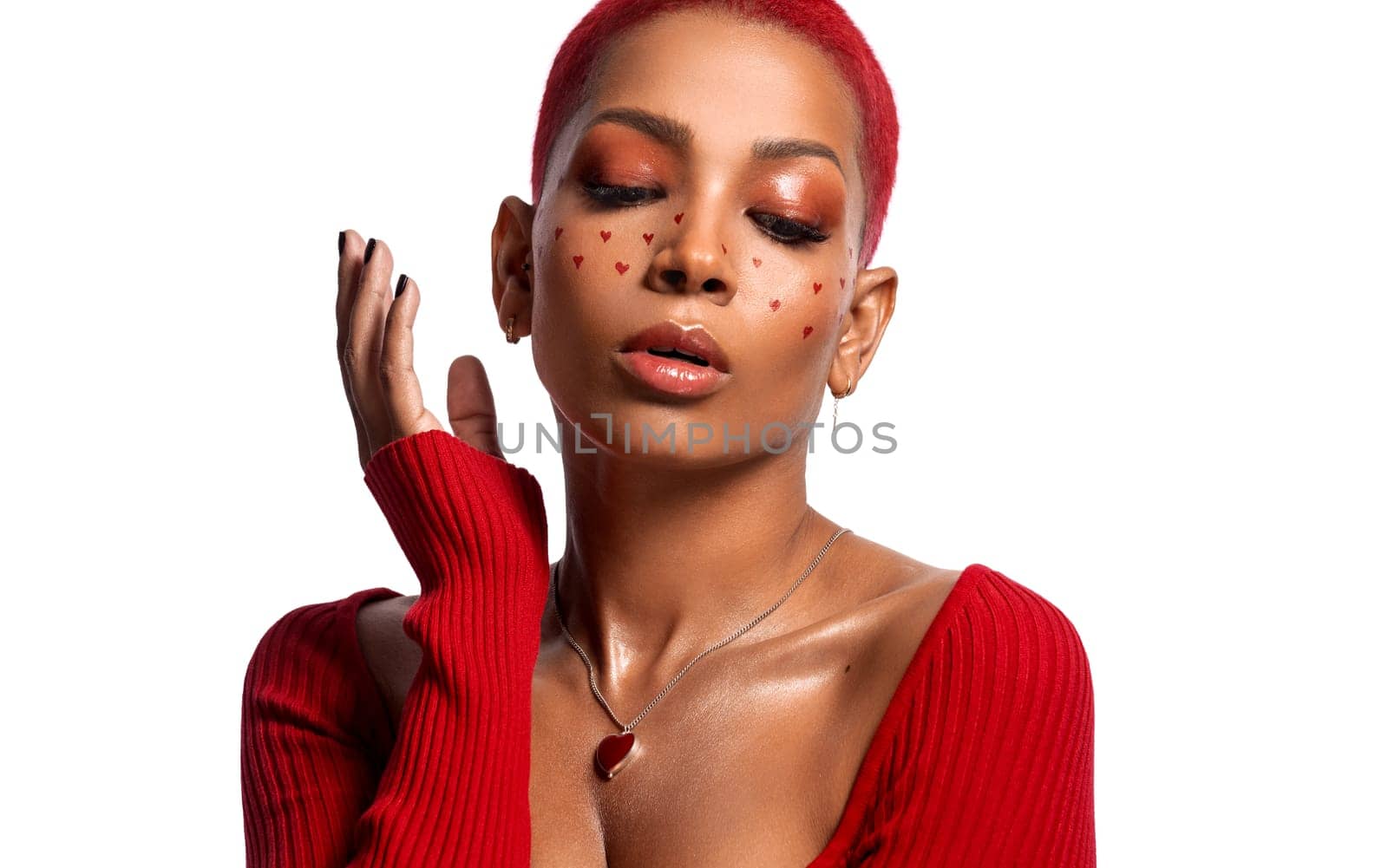 Creative makeup for Valentines day. Portrait of female fashion model isolated on white studio background. Beautiful woman with spring makeup in the shape of small hearts. Beauty concept. by MikeOrlov