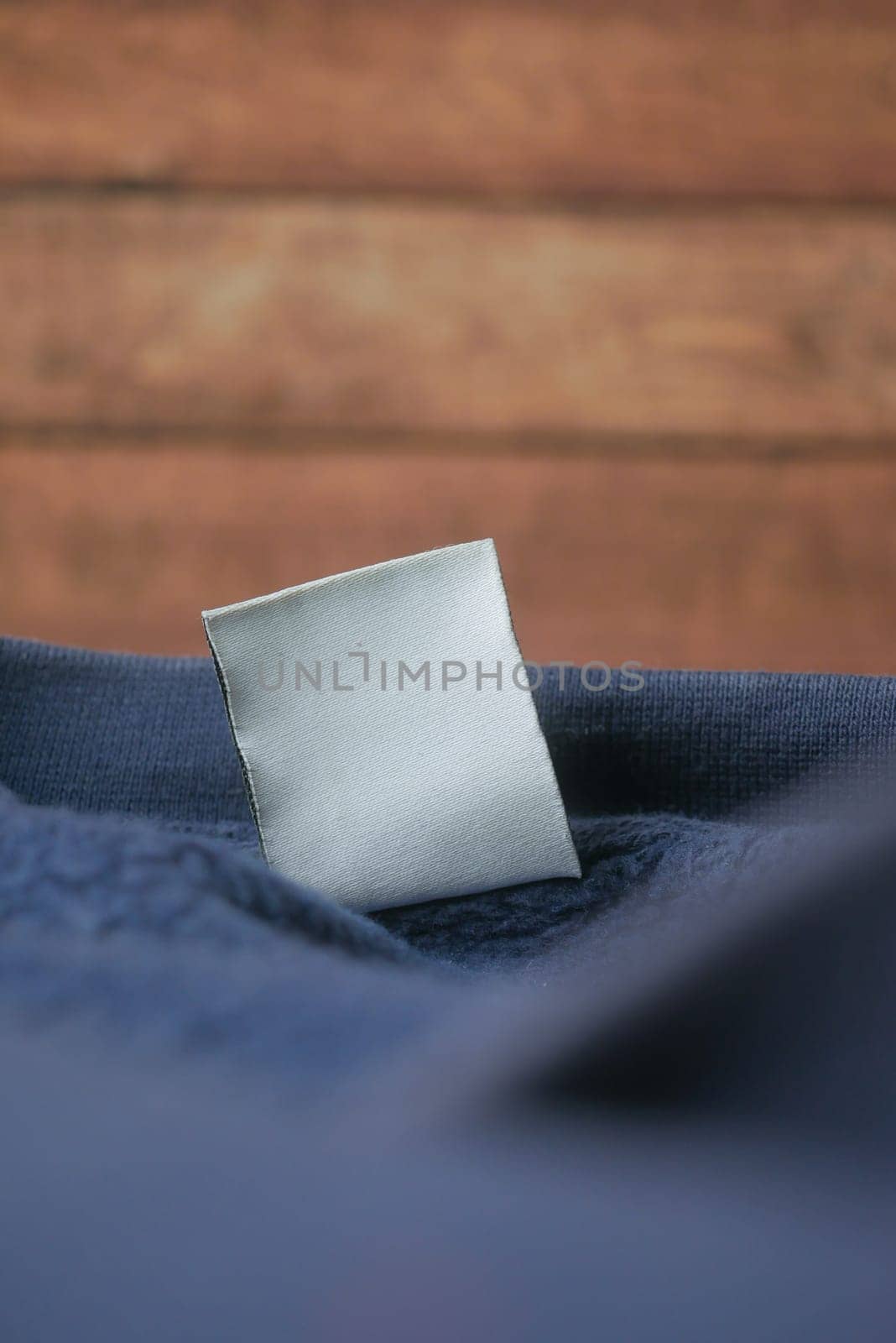 empty white label on a cloth ,