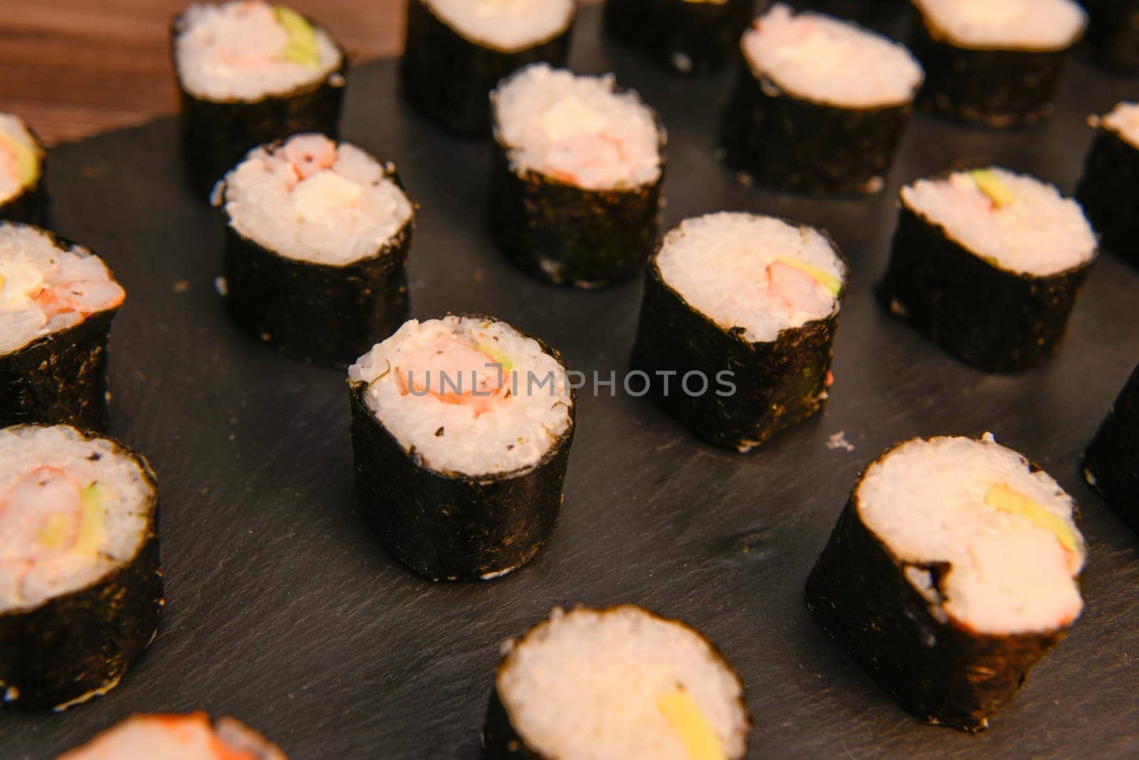 Japanese sushi food, Maki ands rolls with tuna, salmon, shrimp, crab and avocado by FreeProd
