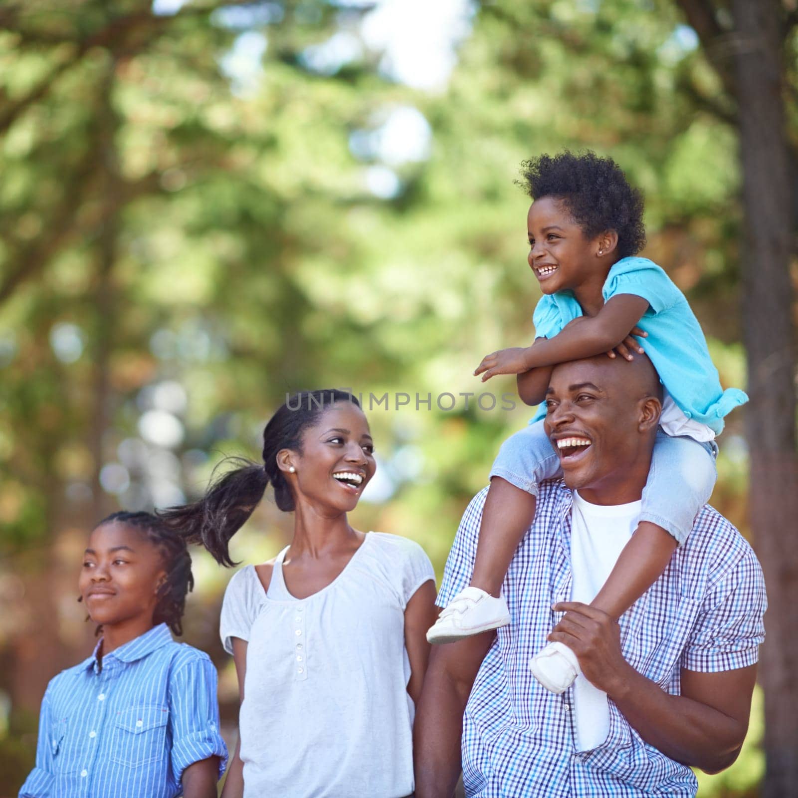 Happy family, children and piggyback in forest for bonding, adventure or outdoor holiday in nature. African mother and dad carrying kid on shoulders smile for walking, support or weekend in fresh air.