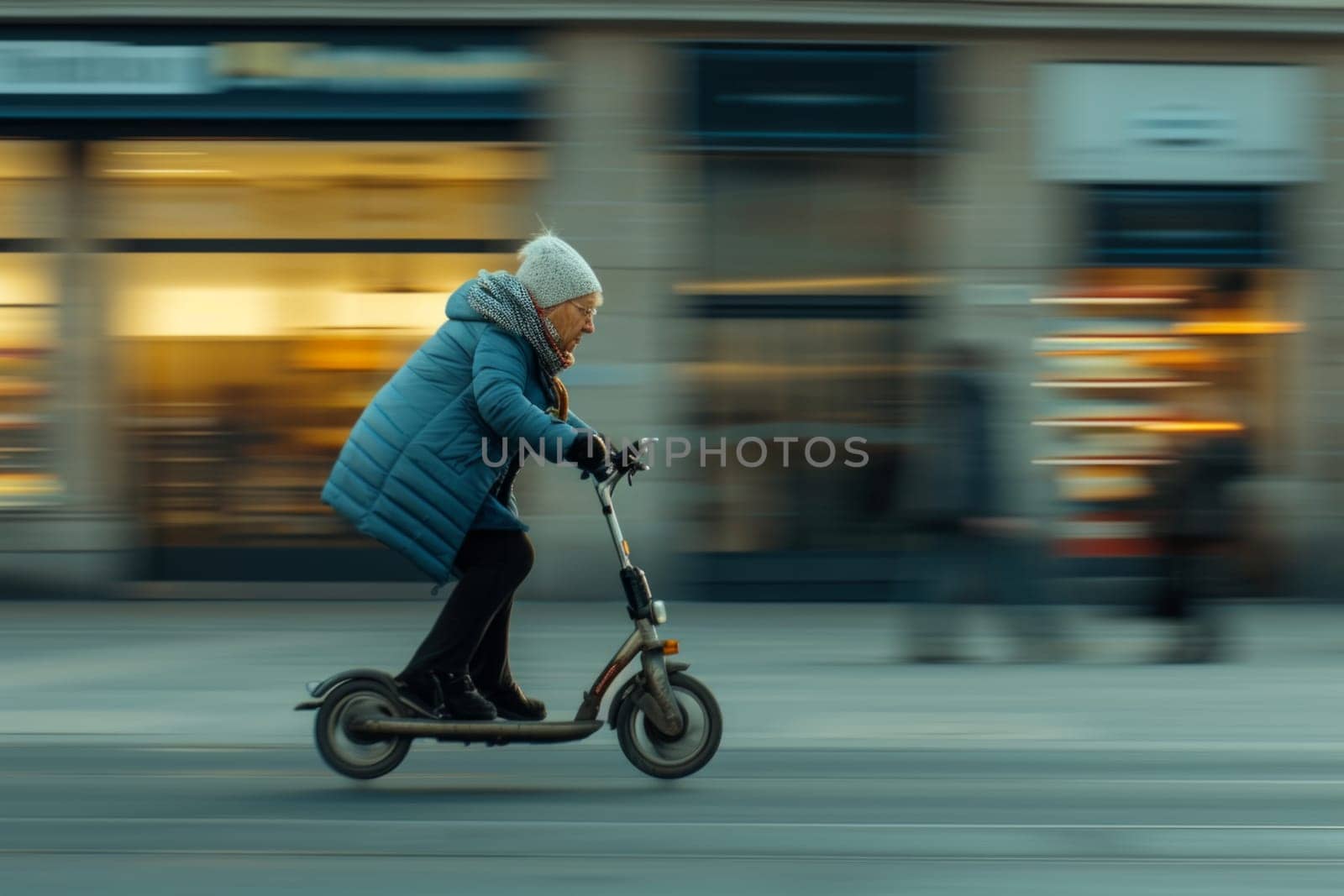 cheerful elderly woman moving fast with a electric scooter by papatonic