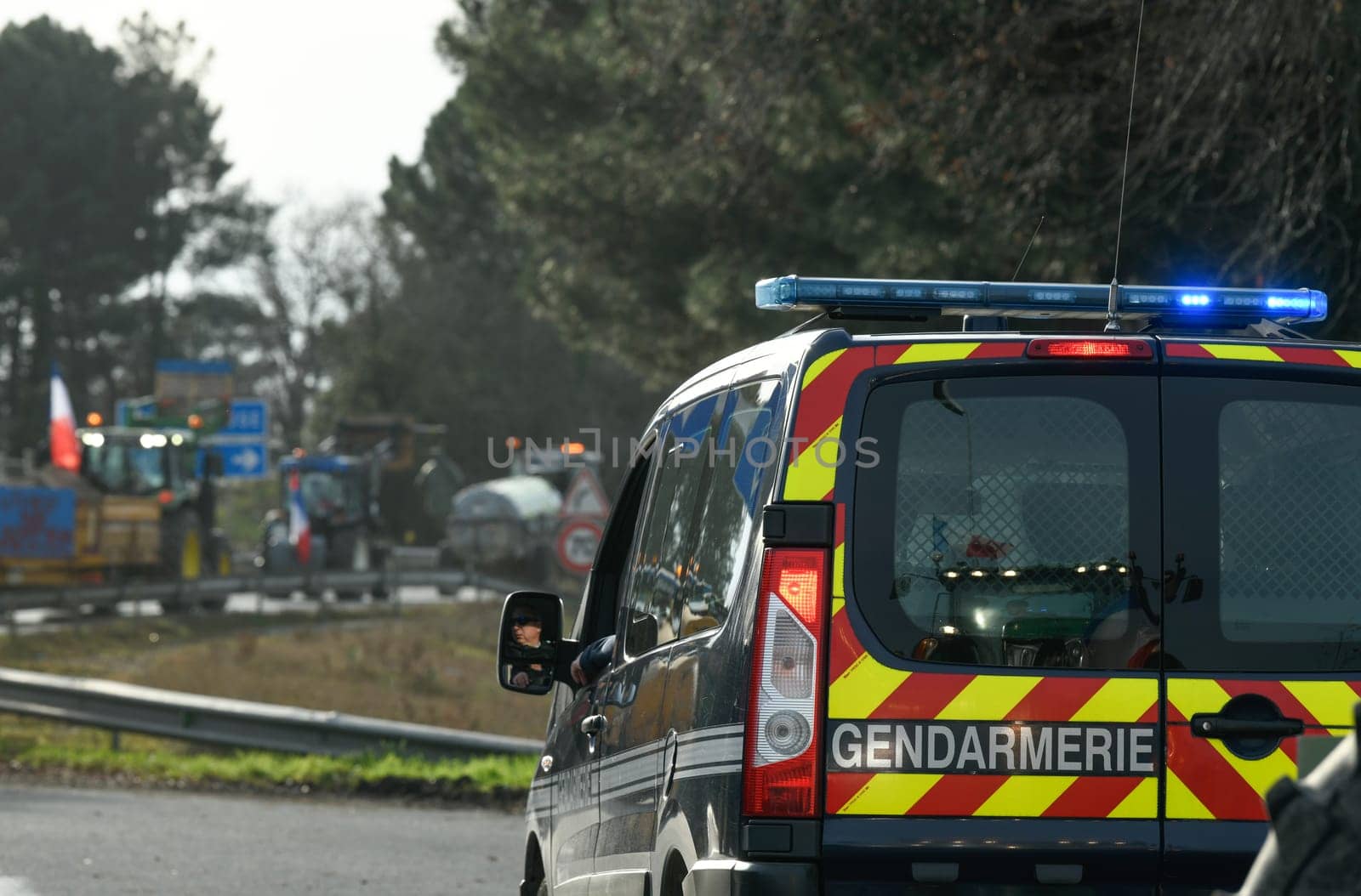 France, Bordeaux, 29 January 2024, Farmers' demonstration, mobile police on their car securing a demonstration by French farmers on a motorway in south-west France by FreeProd