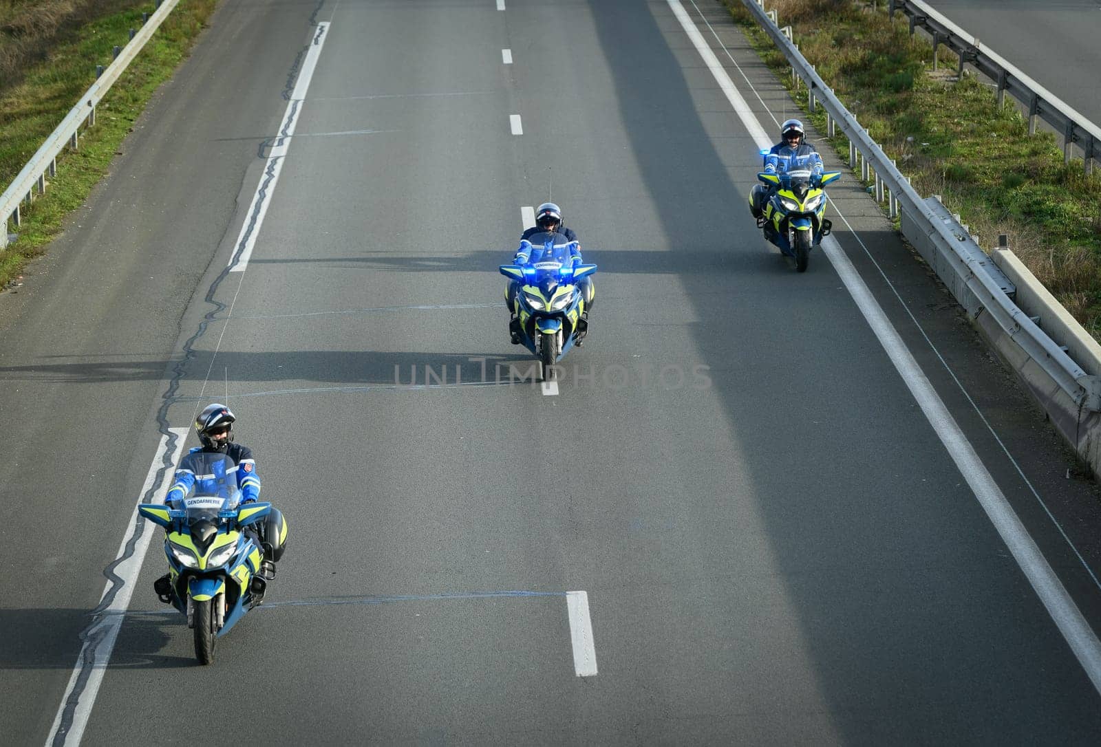 France, Bordeaux, 29 January 2024, Farmers' demonstration, mobile gendarmes on their motorbikes securing a demonstration by French farmers on a motorway in south-west France. High quality 4k footage