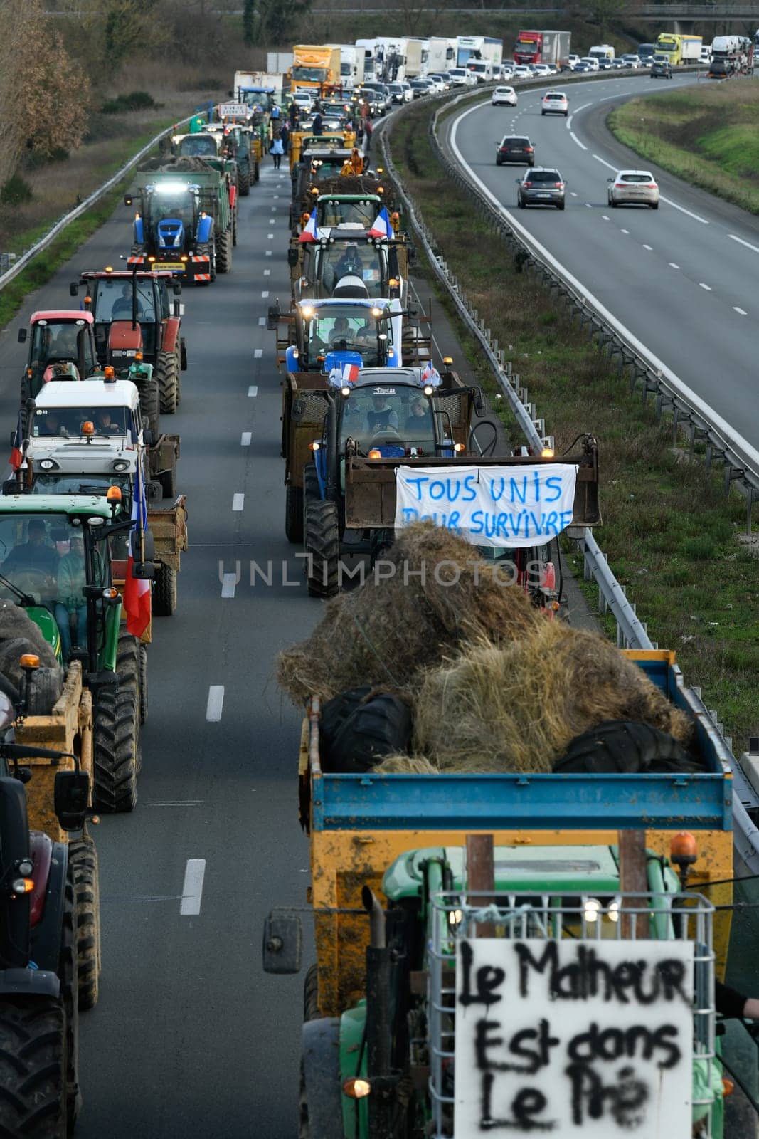 France, Bordeaux, 29 January 2024, Farmers' demonstration, blockade of the Langon toll plaza and snail mail operation on the A62 motorway. High quality 4k footage