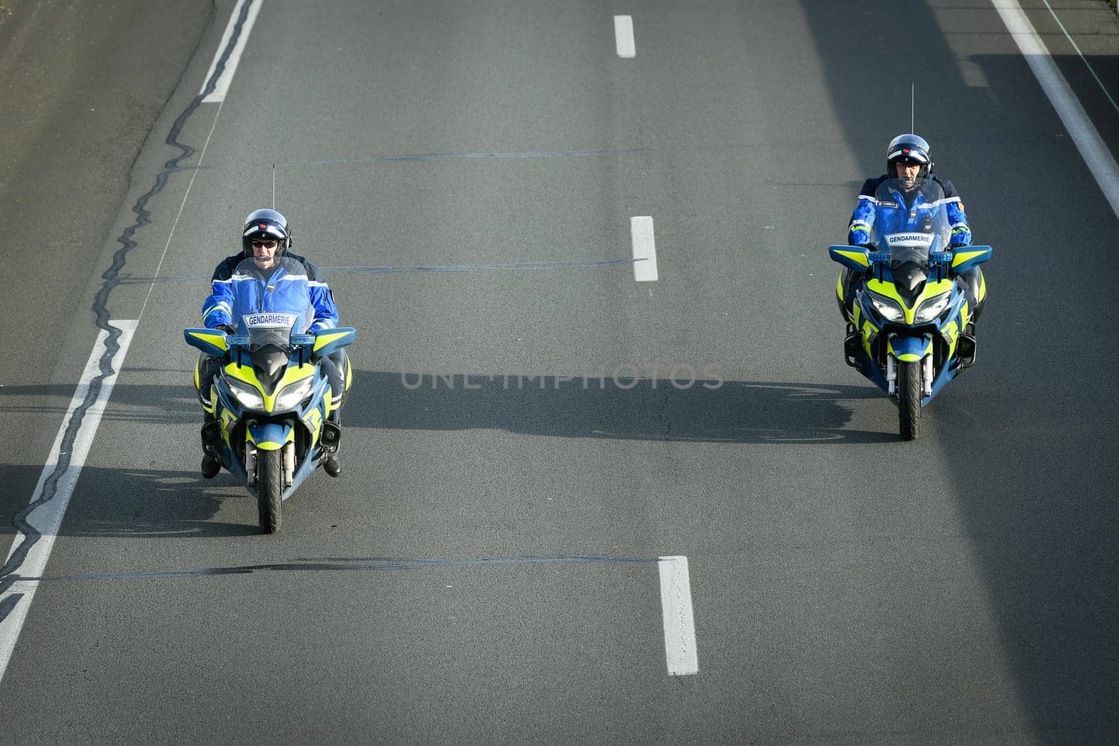 France, Bordeaux, 29 January 2024, Farmers' demonstration, mobile gendarmes on their motorbikes securing a demonstration by French farmers on a motorway in south-west France. High quality 4k footage