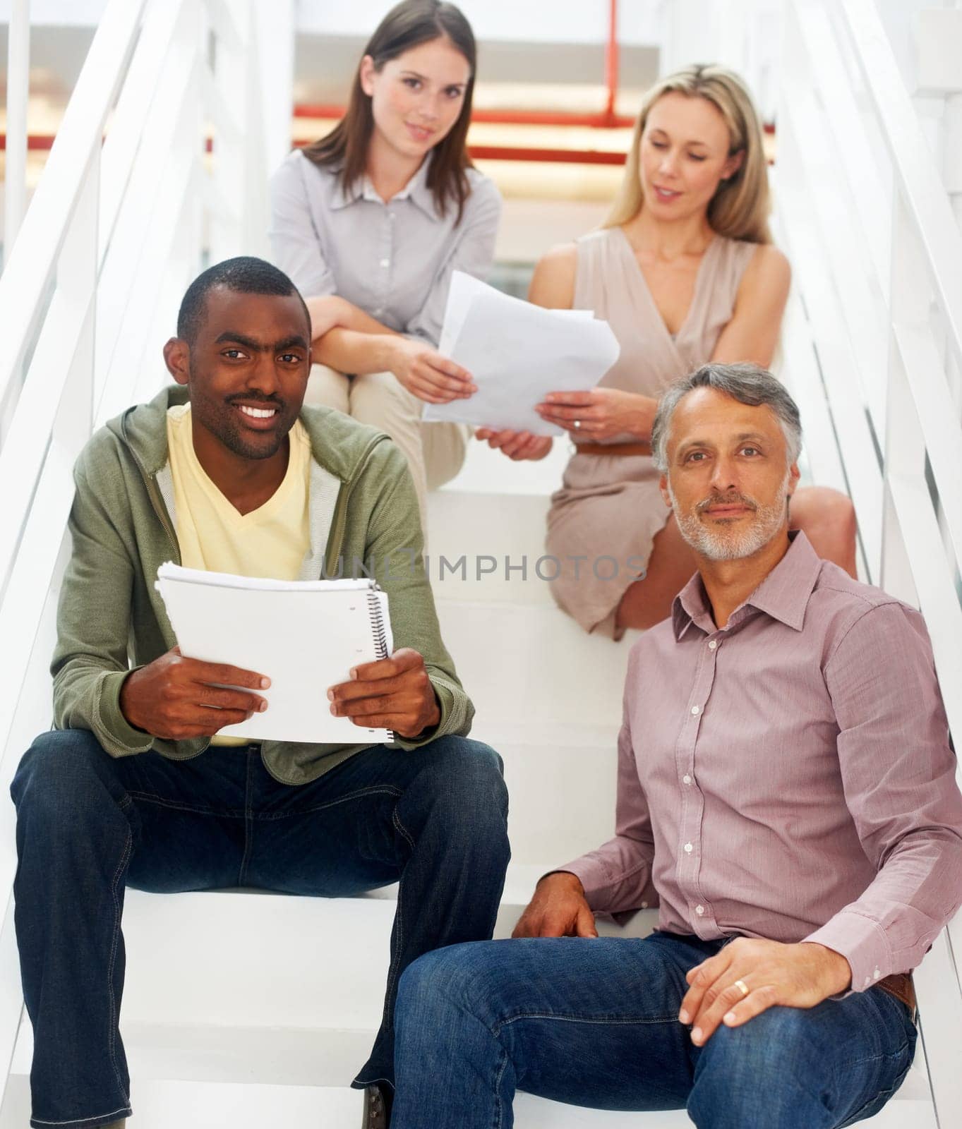 Business people, paperwork and discussion on staircase together, planning and collaboration in office. Teamwork, documents and brainstorming or problem solving, employees and communication on report.