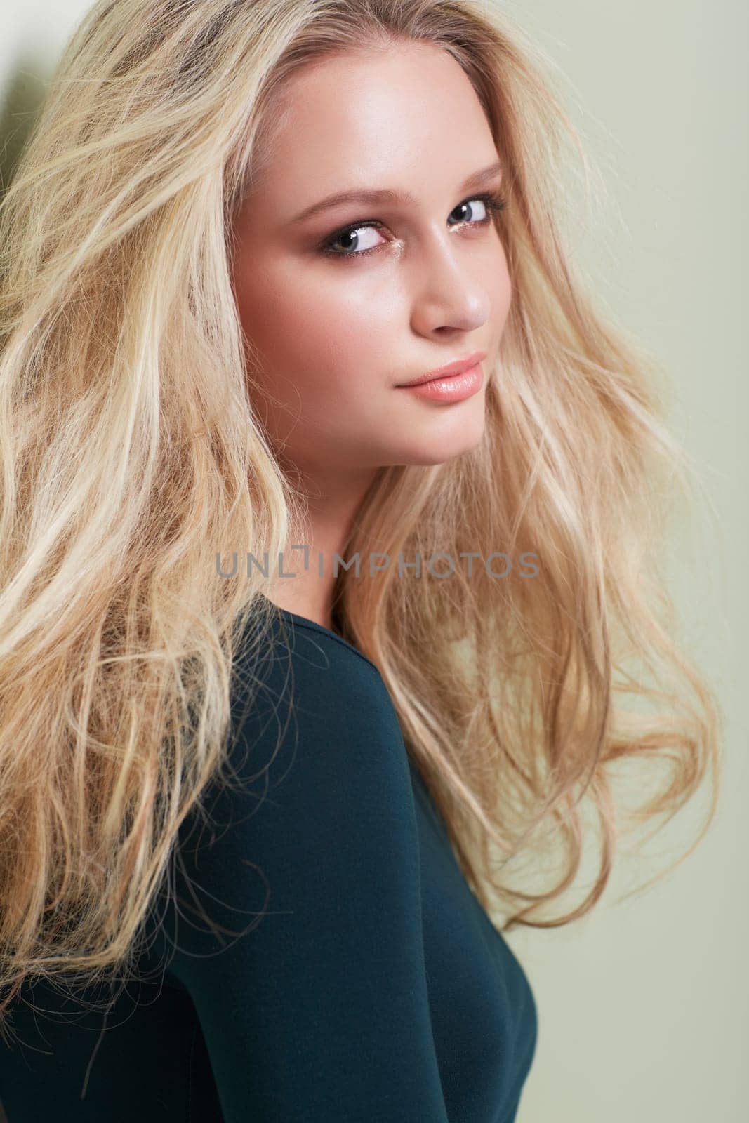 Hair care, beauty and portrait of woman in studio with growth, texture or volume on wall background. Face, hairstyle and female model pose with shampoo, treatment or conditioner, shine for results.