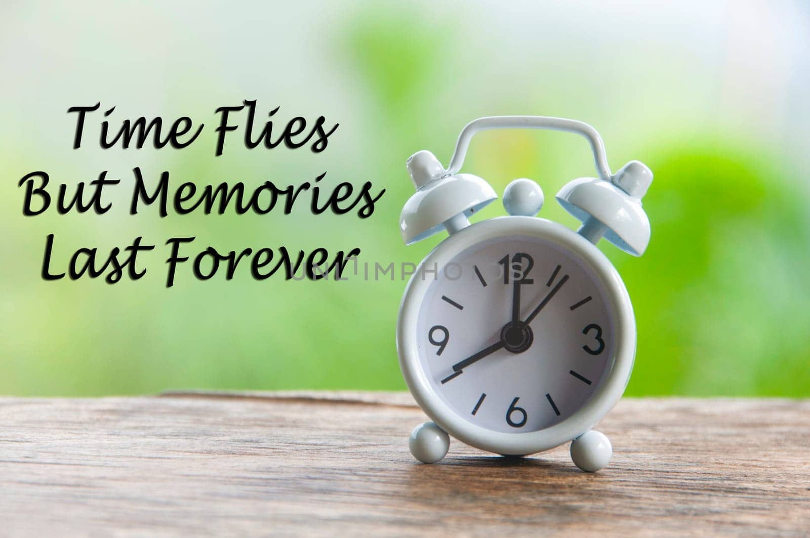 Time flies but memories last forever quote with alarm clock pointing at 8 am. Motivational concepts