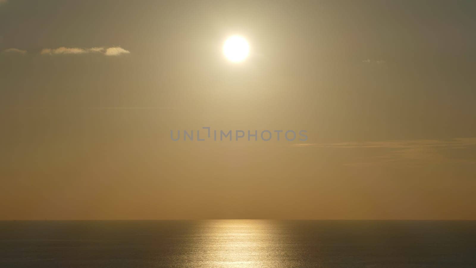 Sunset and reflections in the Cantabrian Sea, Basque Country.