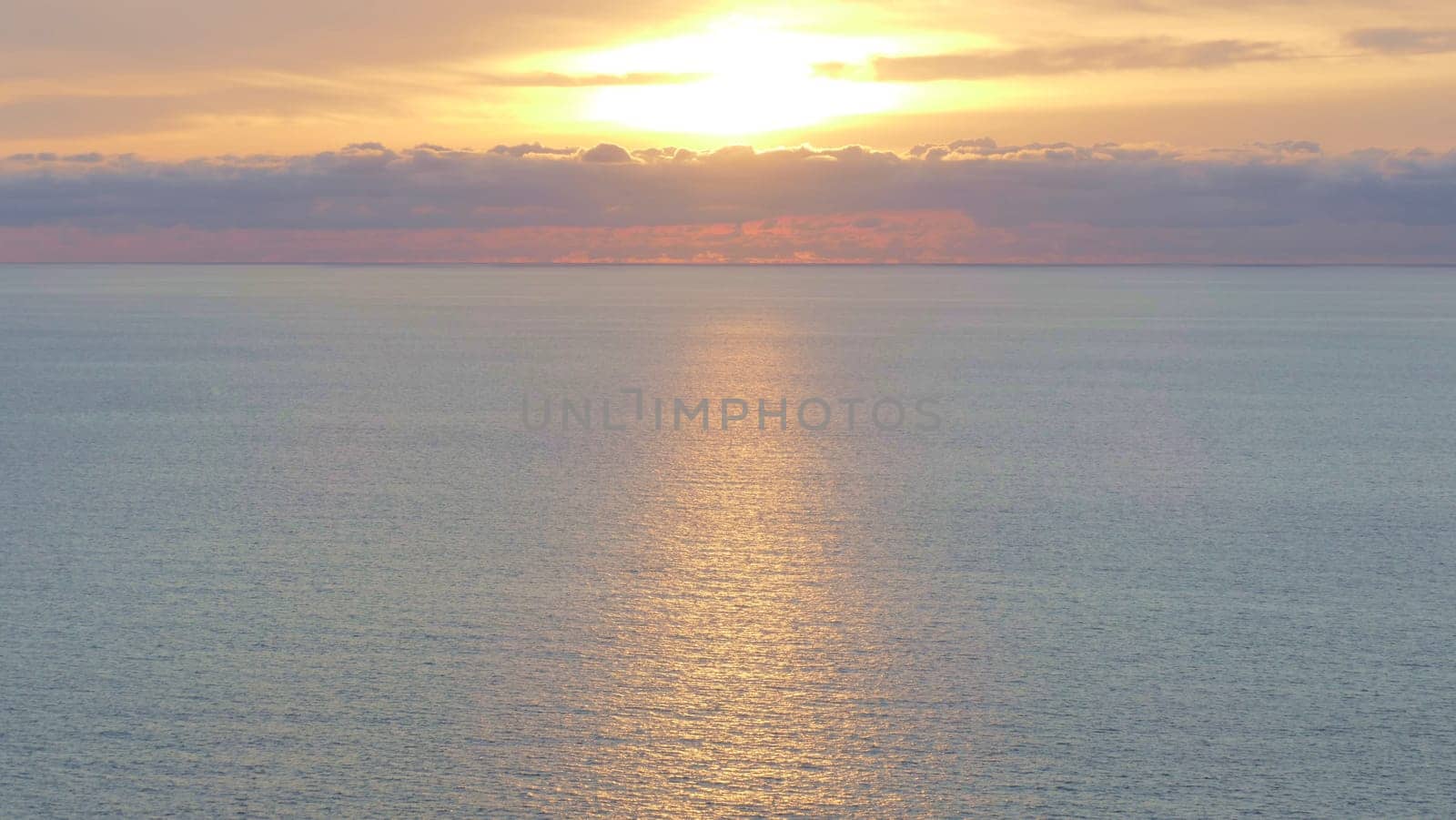 Sunset and reflections in the Cantabrian Sea, Basque Country. by XabiDonostia