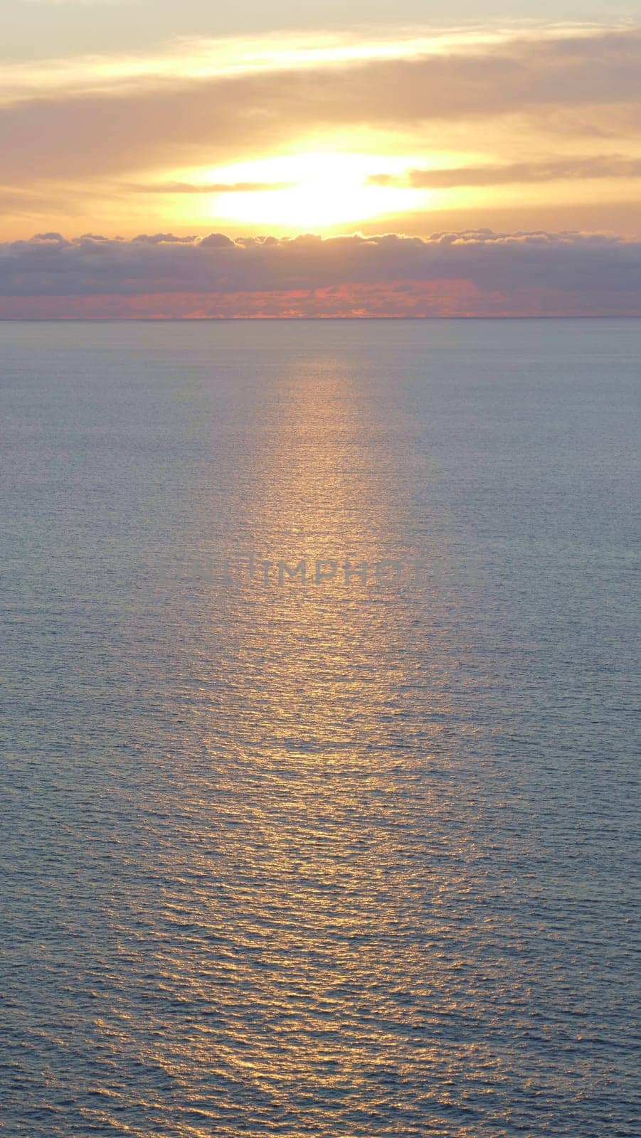 Sunset and reflections in the Cantabrian Sea, Basque Country.