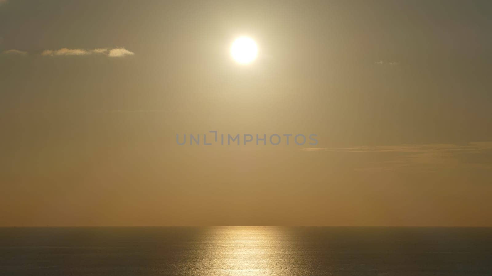 Sunset with reflection on the coast of the Cantabrian Sea