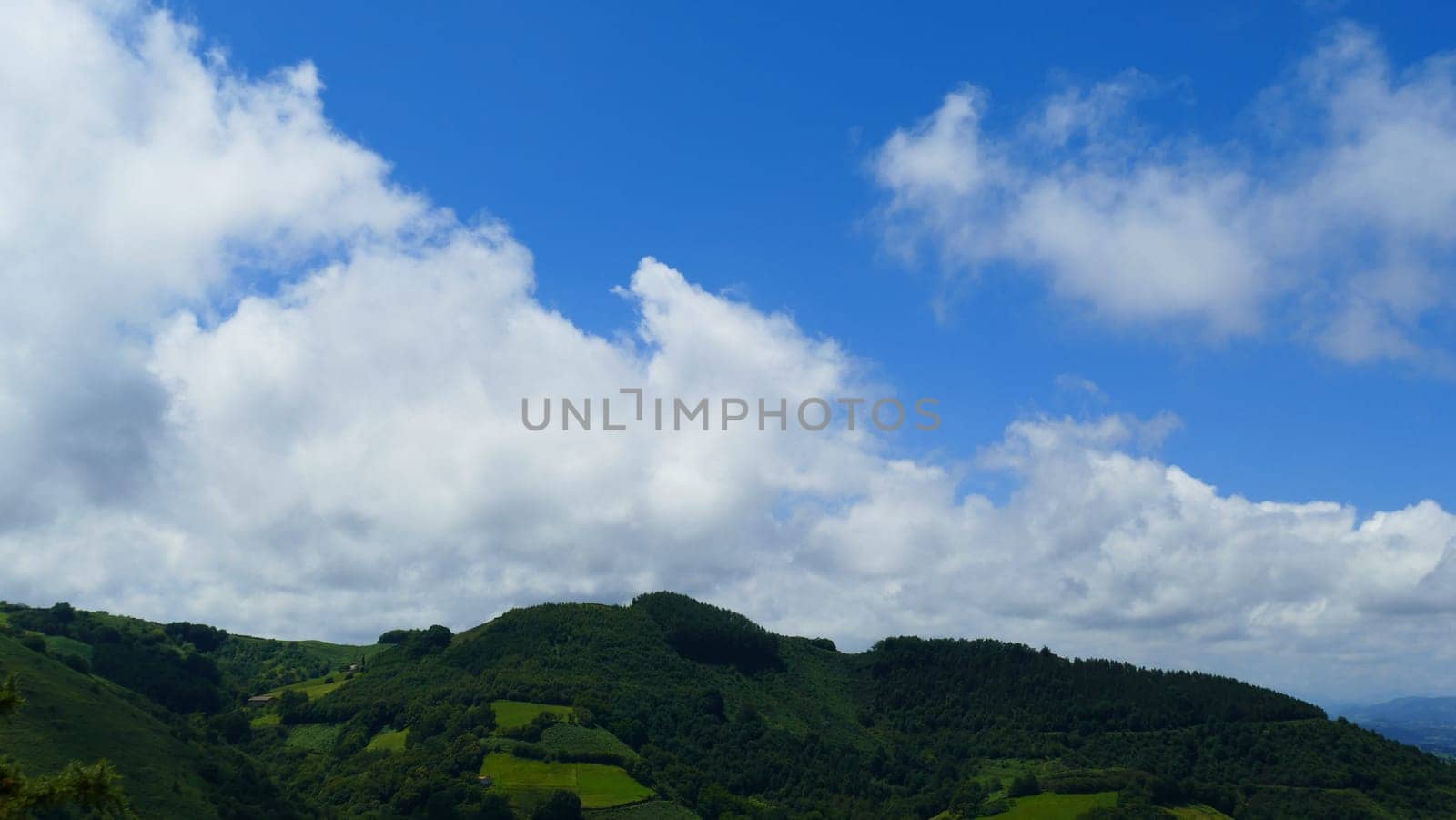 Mountain landscape and sky with clouds