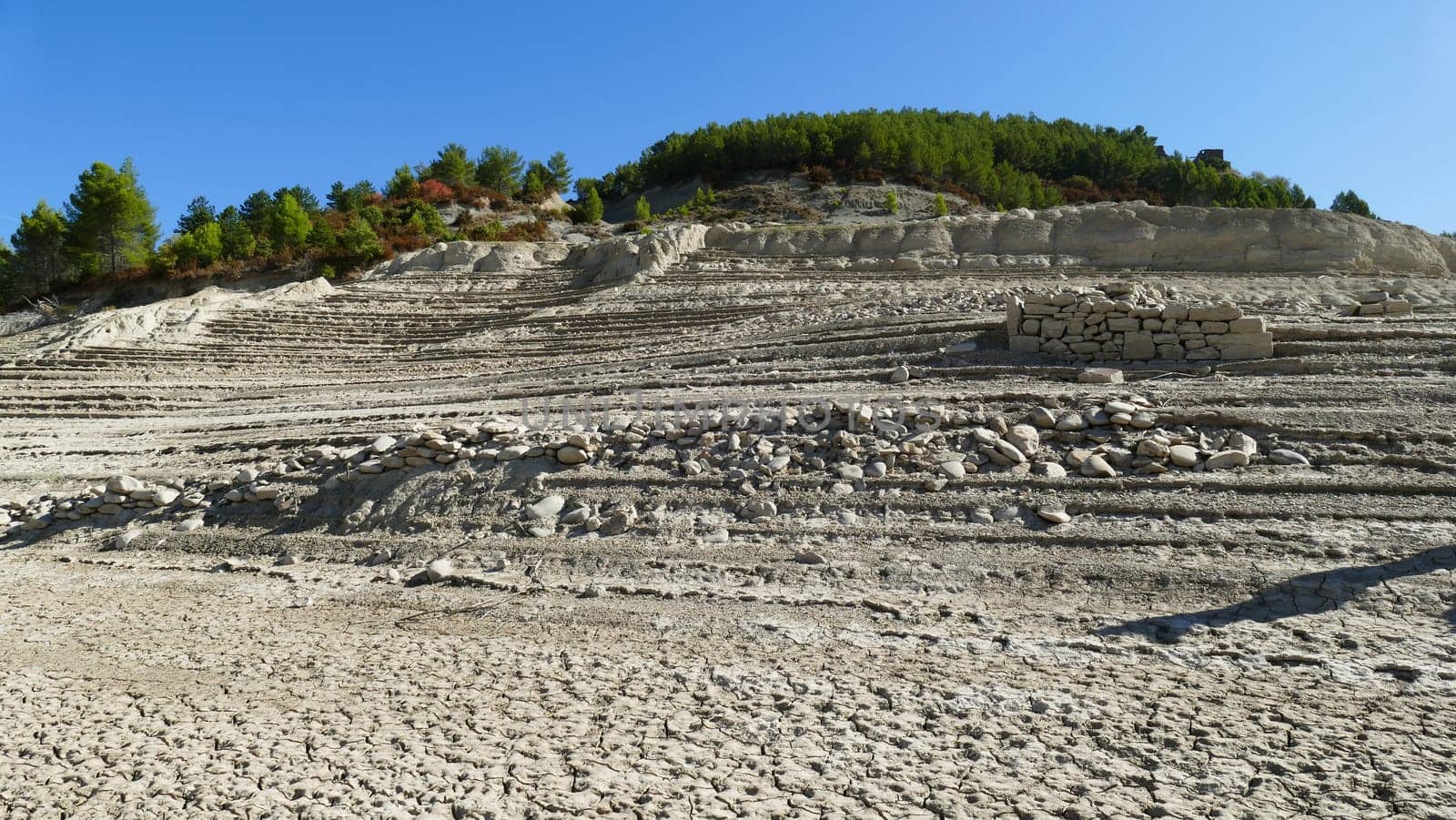 Low water level and remains of the ruins of the Yesa reservoir in Navarre - October, 2019