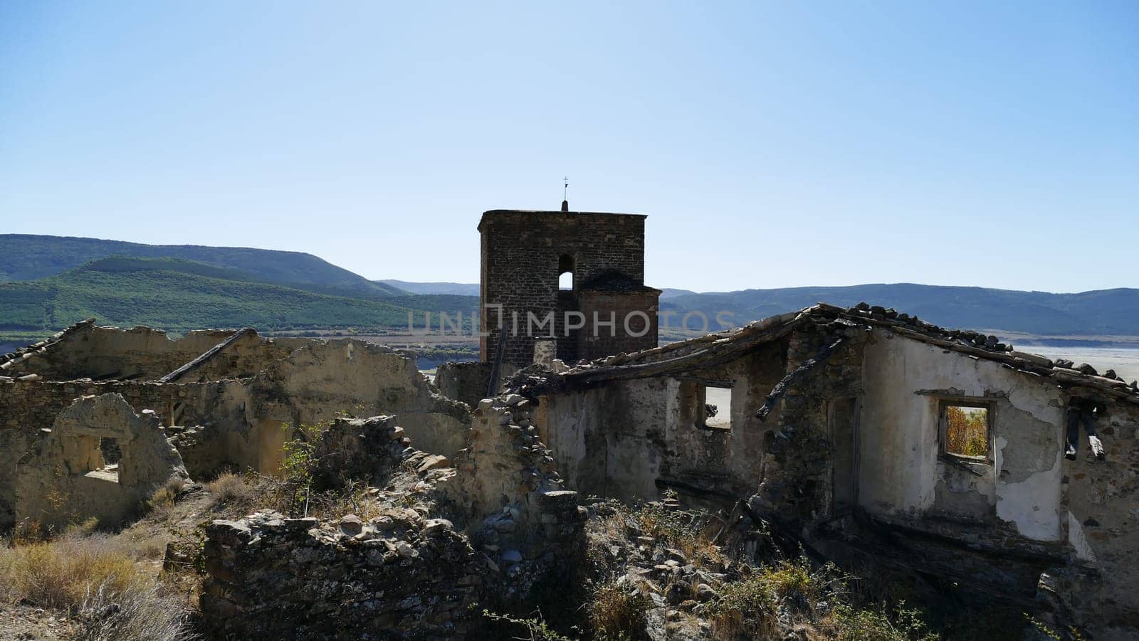 Houses and church of an uninhabited village of Yesa in Navarre by XabiDonostia