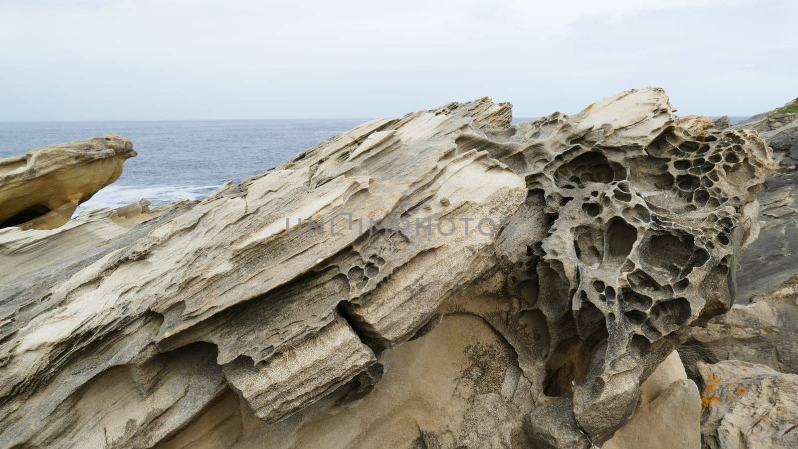 Rocks and limestone eroded on the coast of the sea by XabiDonostia