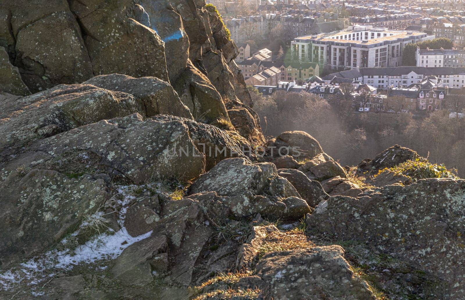 Edinburgh, Scotland - Jan 17, 2024 - Amazing Edinburgh Cityscape seen from the top of Salisbury Crags. Destinations in Europe, Space for text, Selective focus.